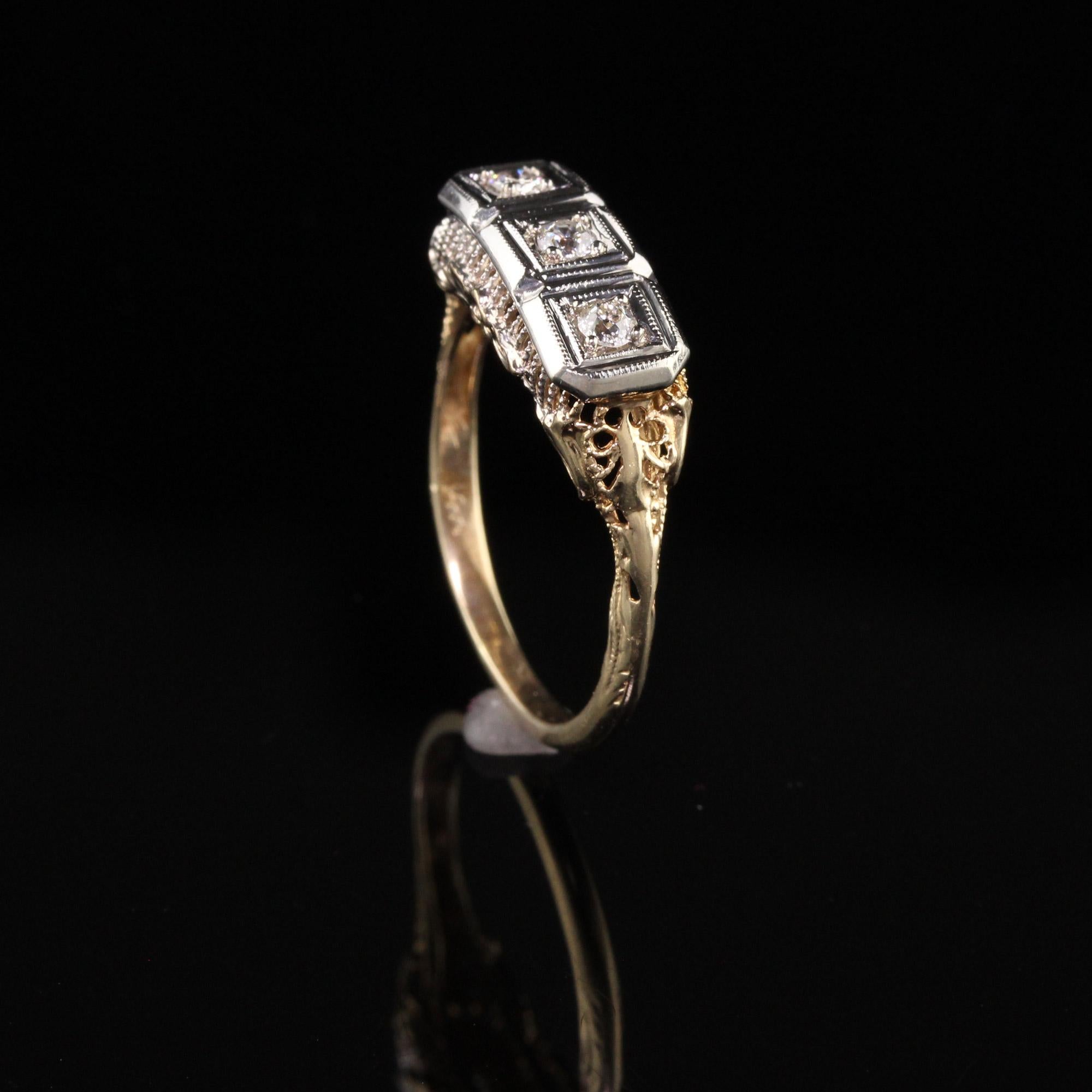 art deco three stone diamond ring