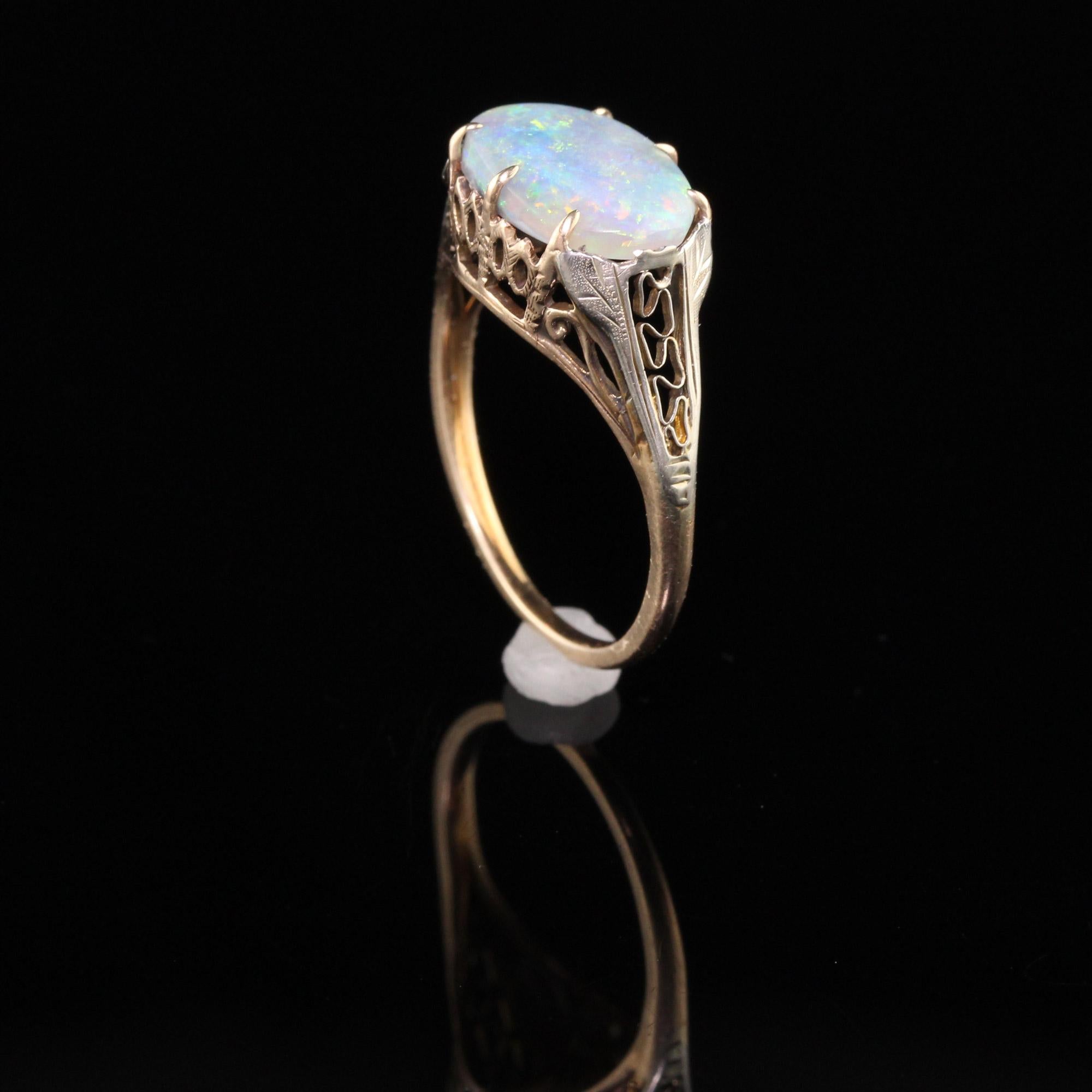 Antique Art Deco 14k Yellow Gold Two Tone Black Opal Filigree Ring In Good Condition In Great Neck, NY