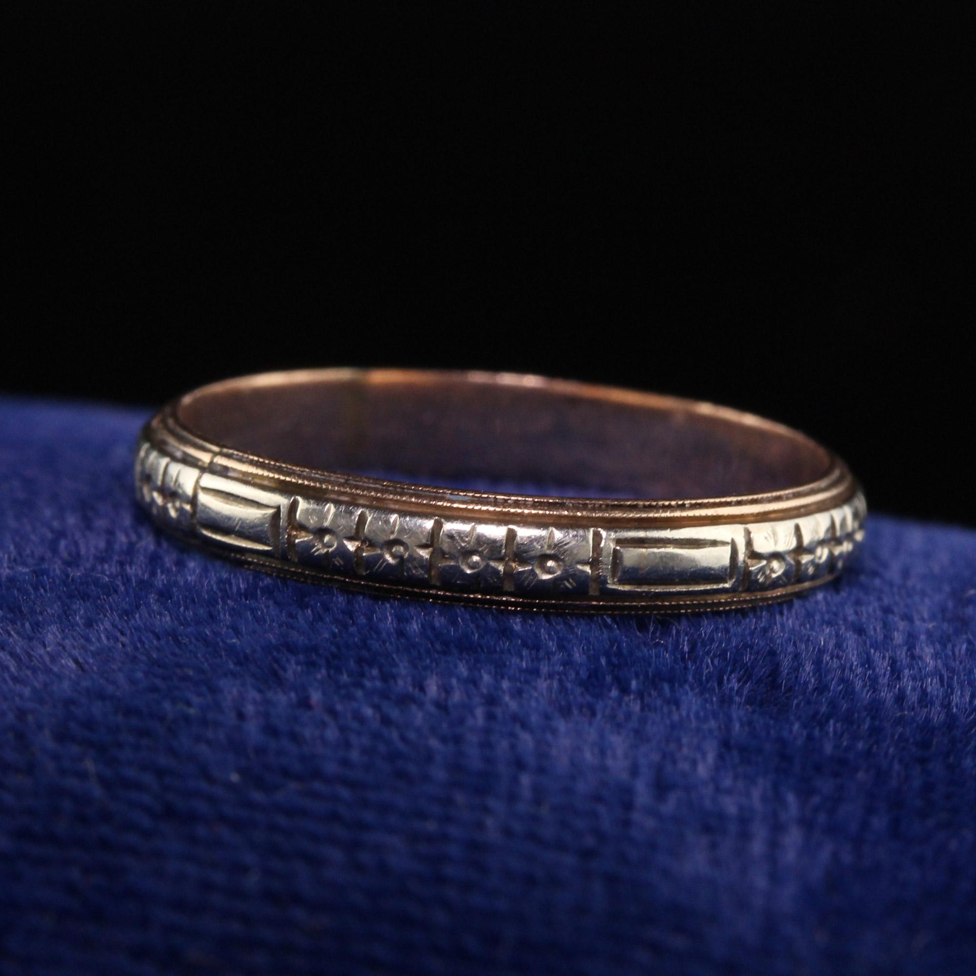 Beautiful Antique Art Deco 14K Yellow Gold Two Tone Engraved Wedding Band - Size 8 1/4. This gorgeous art deco wedding band is engraved around the entire ring. The ring is crafted in yellow gold and white gold and looks incredible.

Item