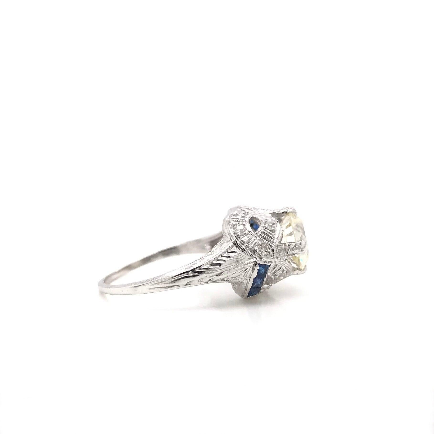 Women's Antique Art Deco 1.50 Carat Diamond and Sapphire Platinum Filigree Ring For Sale