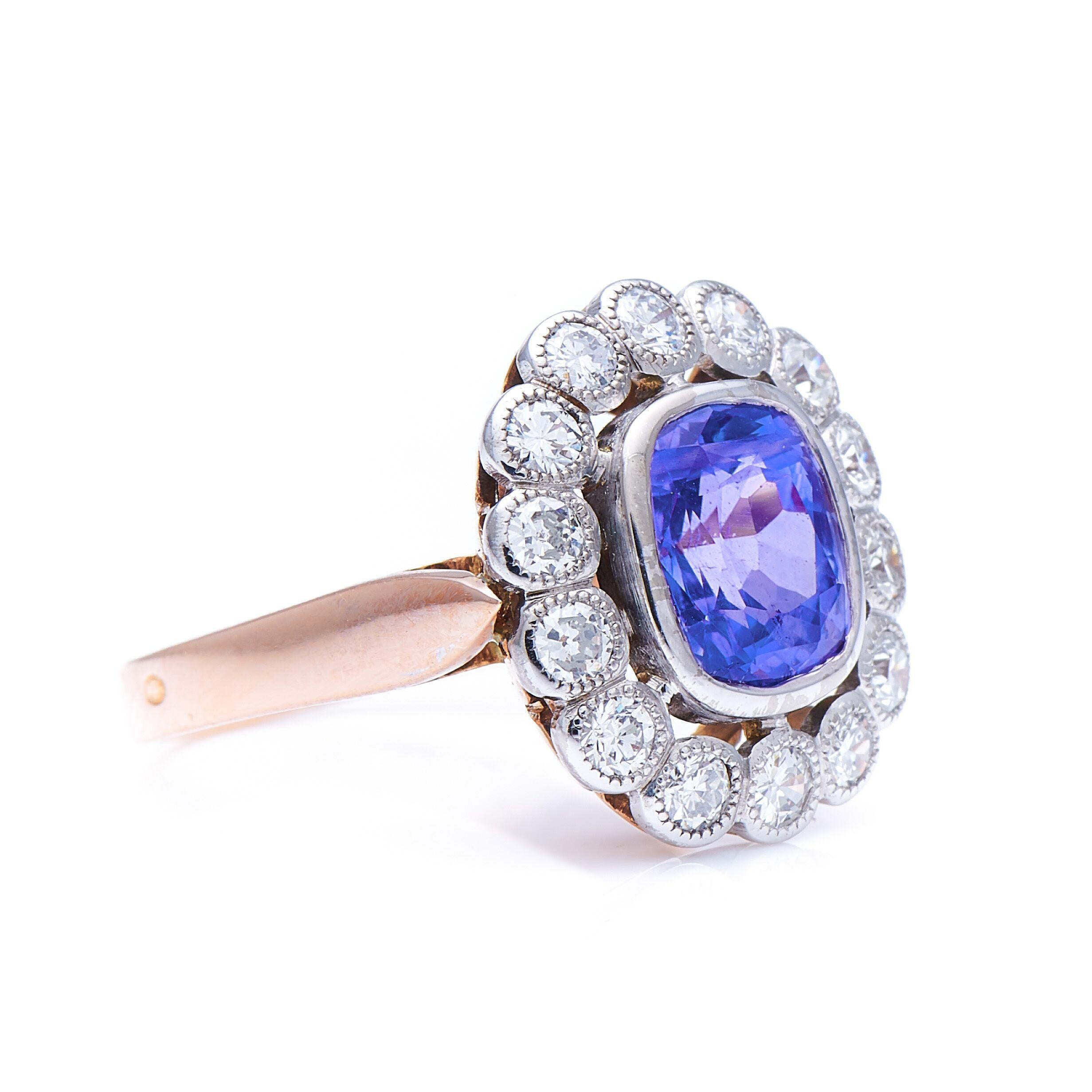 Colour-change sapphire and diamond ring. This unheated Sri Lankan sapphire appears a subtle cornflower blue in daylight, and a soft violet in incandescent light. The reason for this unusual phenomenon is the presence of Chromium in the stone, which