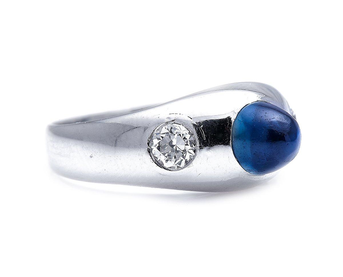 Cabochon Sapphire and Diamond Ring. Setting stones into a band, without any collet or claws, is known as a rub-over setting, and it’s one of the oldest, simplest, and safest ways of setting stones. This ring, in smooth white gold, is rub-over-set