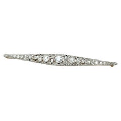 Antica spilla Art Deco in oro 18k e platino con diamanti graduati da 3,40 ct.