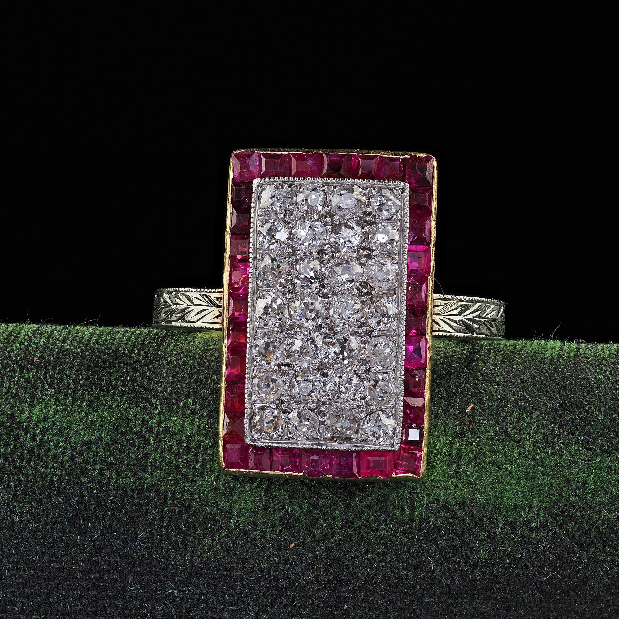 Beautiful Antique Art Deco 18K Two Tone Gold Old Mine Diamond and Ruby Panel Ring. This incredible Art Deco old mine diamond and ruby panel ring is crafted in 18k white gold and yellow gold. The ring features a wall of old mine cut diamonds set on