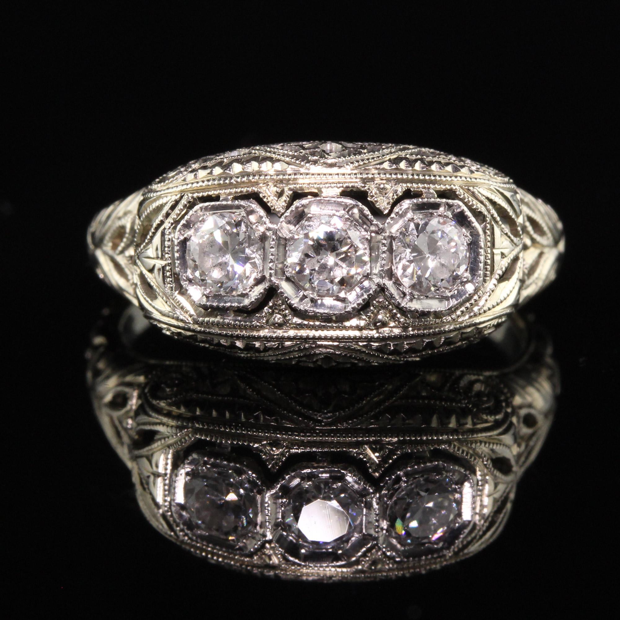 Antique Art Deco 18K White Gold and Platinum Old Euro Diamond Three Stone Ring In Good Condition In Great Neck, NY
