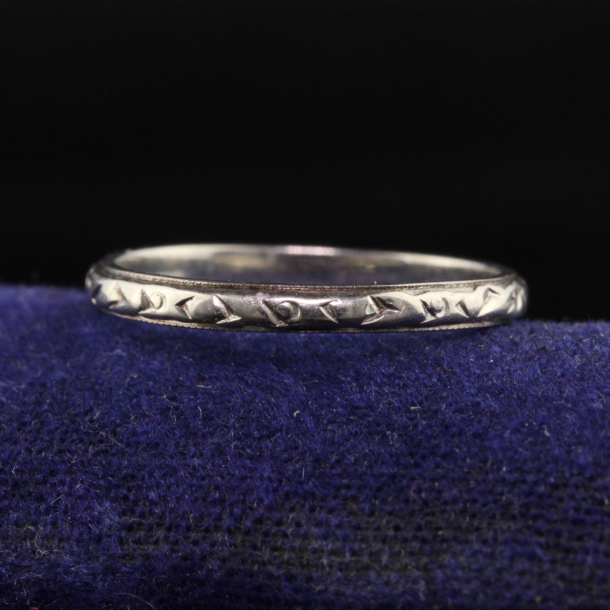 Beautiful Antique Art Deco 18K White Gold Belais Engraved Wedding Band - Size 6. This beautiful wedding band is crafted in 18k white gold. This band is beautifully engraved all around the ring and is in good condition.

Item #R1269

Metal: 18K White