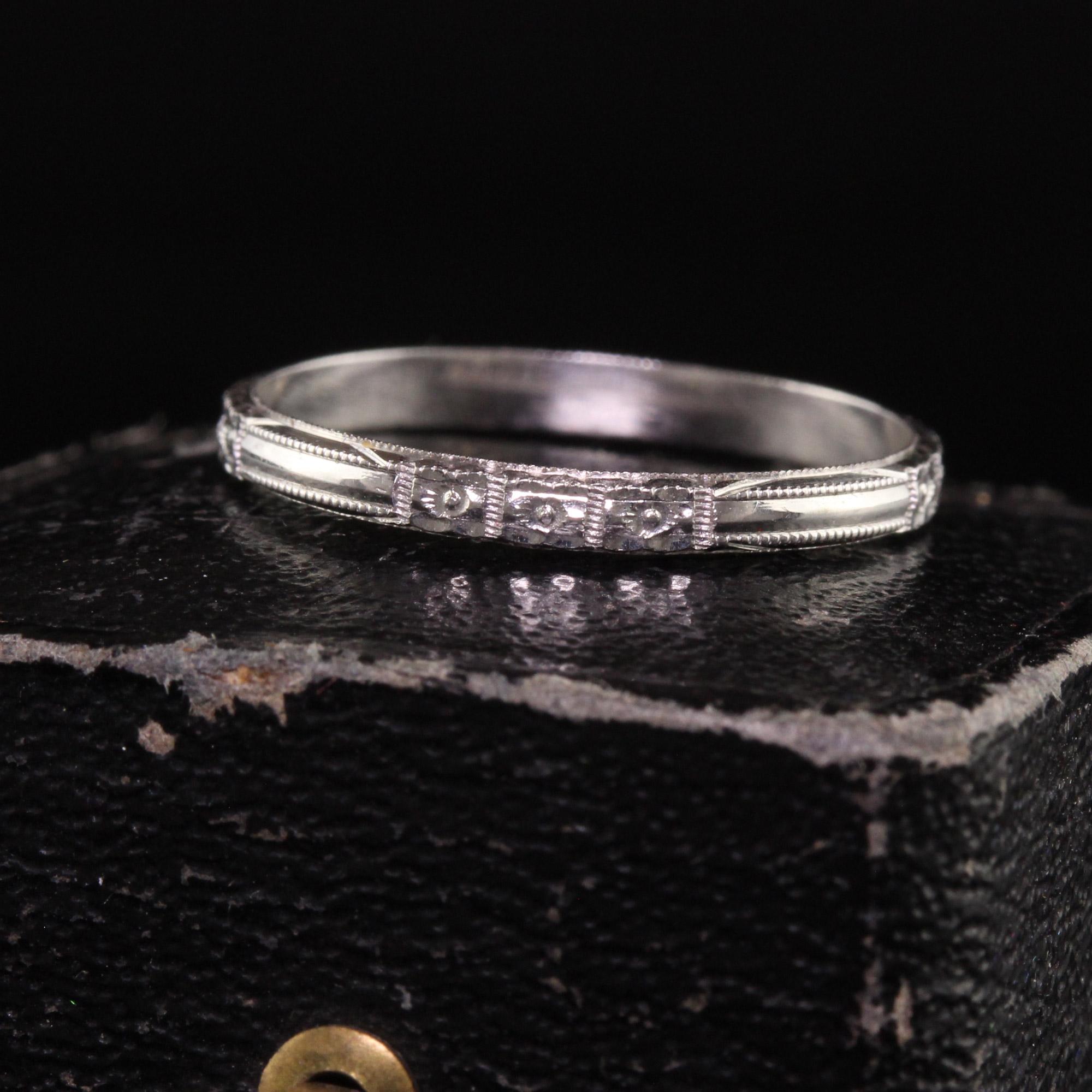Beautiful Antique Art Deco 18K White Gold Blossom Engraved Wedding Band. This gorgeous band is crafted in 18K white gold. The ring is incredible condition and like new. The band has engravings on both the top and sides and looks amazing.

Item