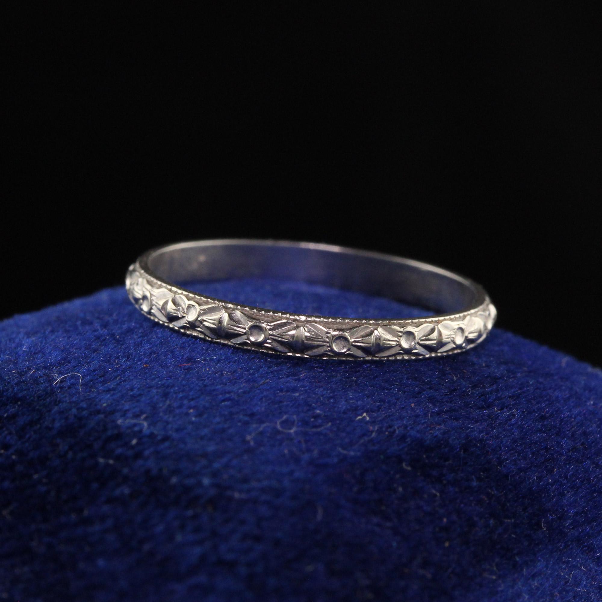 Beautiful Antique Art Deco 18K White Gold Bristol Engraved Wedding Band - Size 4 1/2. This beautiful wedding band has nice visible engravings going around the entire ring and is in great condition.

Item #R0977

Metal: 18K White Gold

Weight: 1