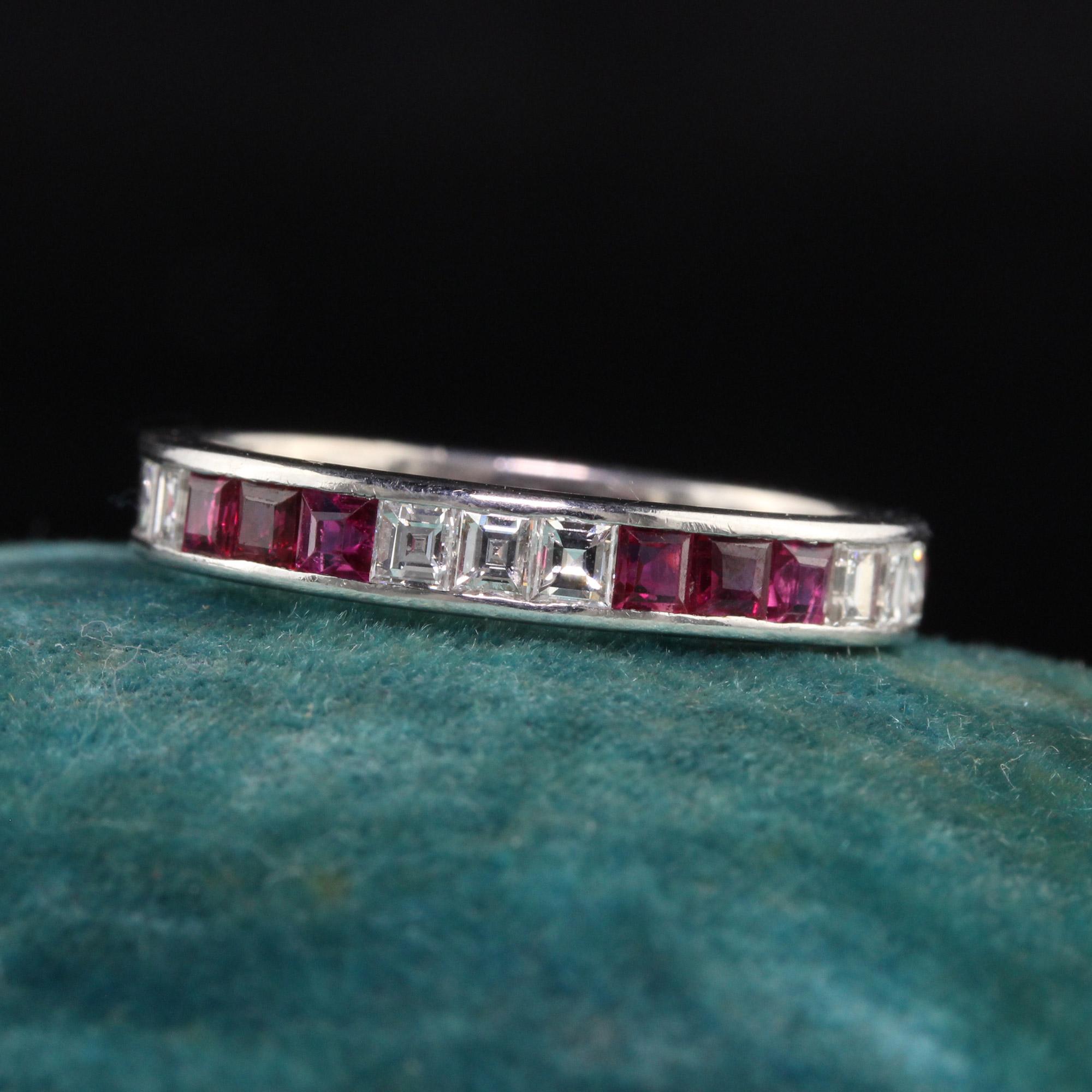 Beautiful Antique Art Deco 18K White Gold Carre Cut Diamond and Ruby Wedding Band. This beautiful wedding band is crafted in 18k white gold. There are carre cut diamonds and rubies in groups of three going around the entire ring. It is in good