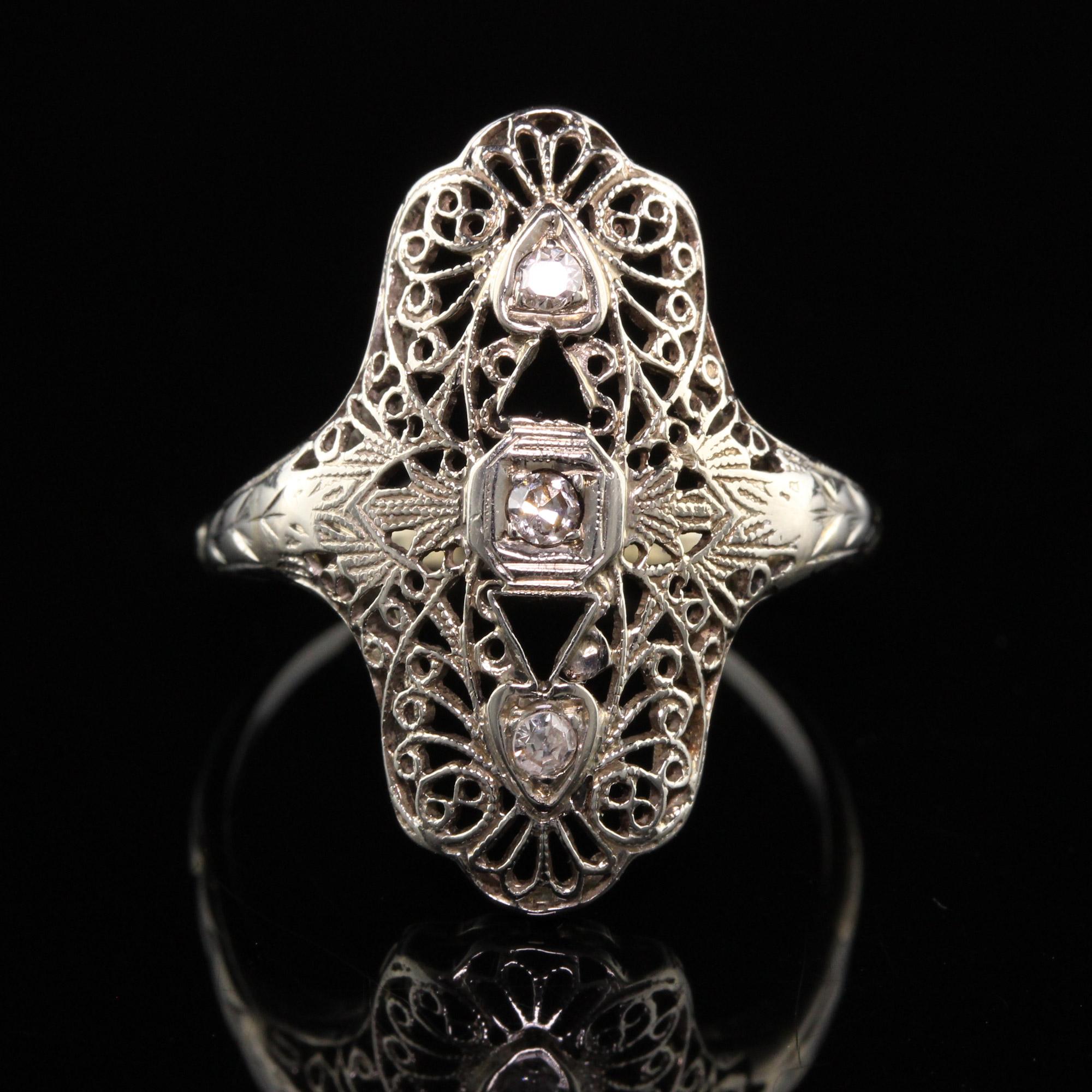 Antique Art Deco 18K White Gold Diamond and Filigree Shield Ring In Fair Condition In Great Neck, NY