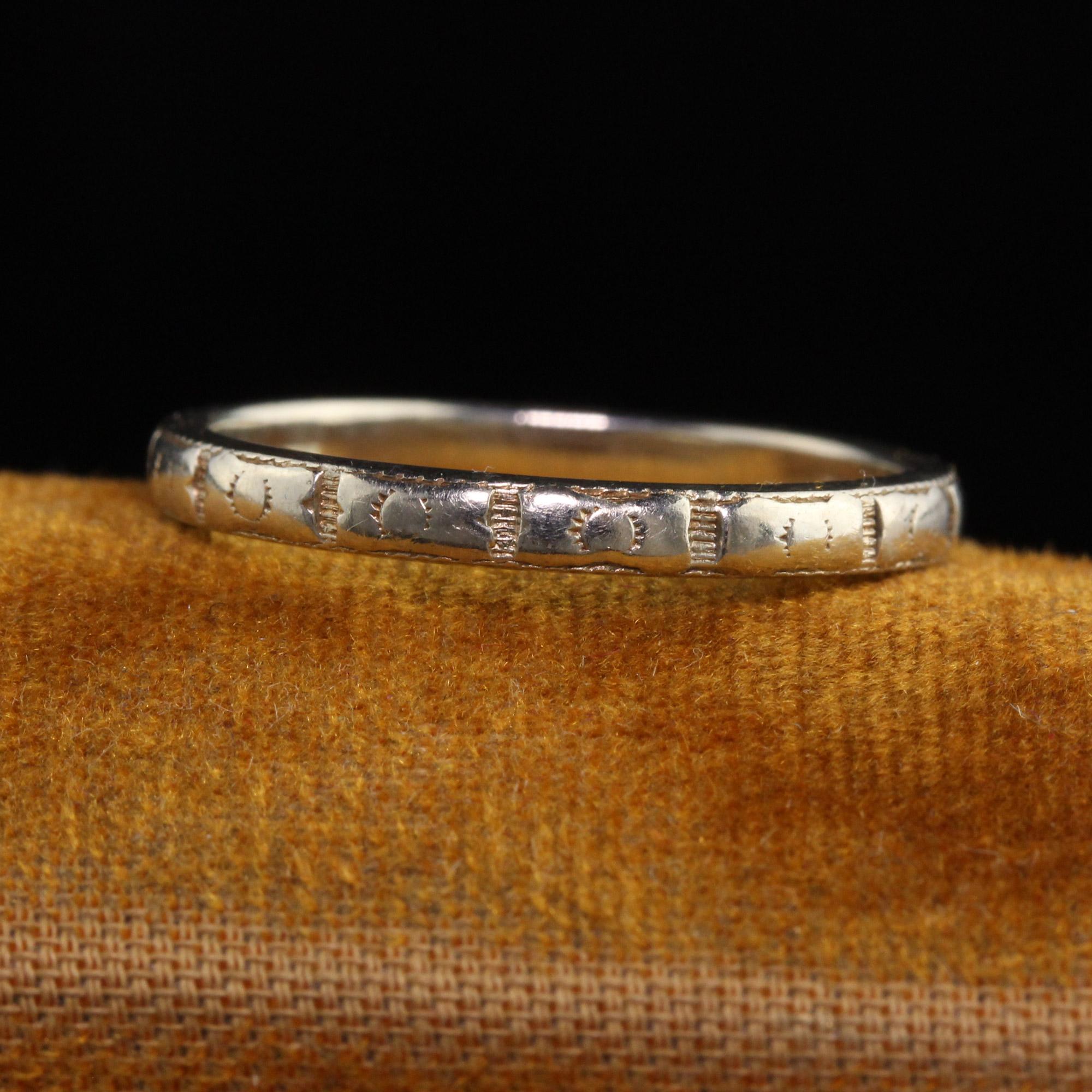 Beautiful Antique Art Deco 18K White Gold Engraved Wedding Band. This beautiful wedding band is engraved around the entire ring with a pattern and is in good condition.

Item #R1162

Metal: 18K White Gold

Weight: 3.3 Grams

Size: 8

Measurements: