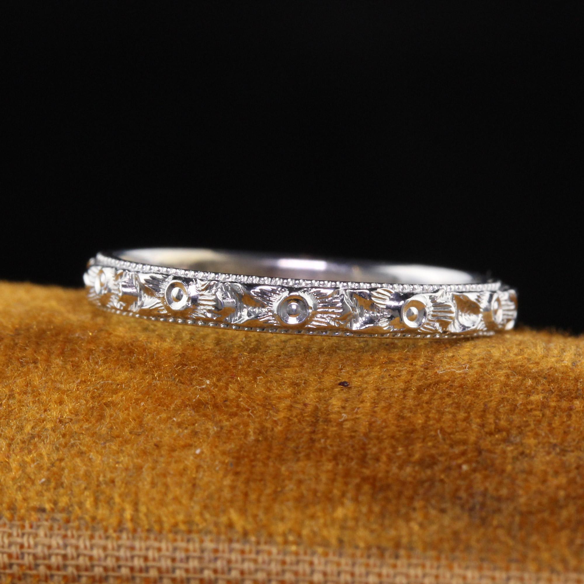 Beautiful Antique Art Deco 18K White Gold Engraved Wedding Band - Size 5 1/4. This crisp wedding band has very fine and deep engravings going around the entire band and is engraved 