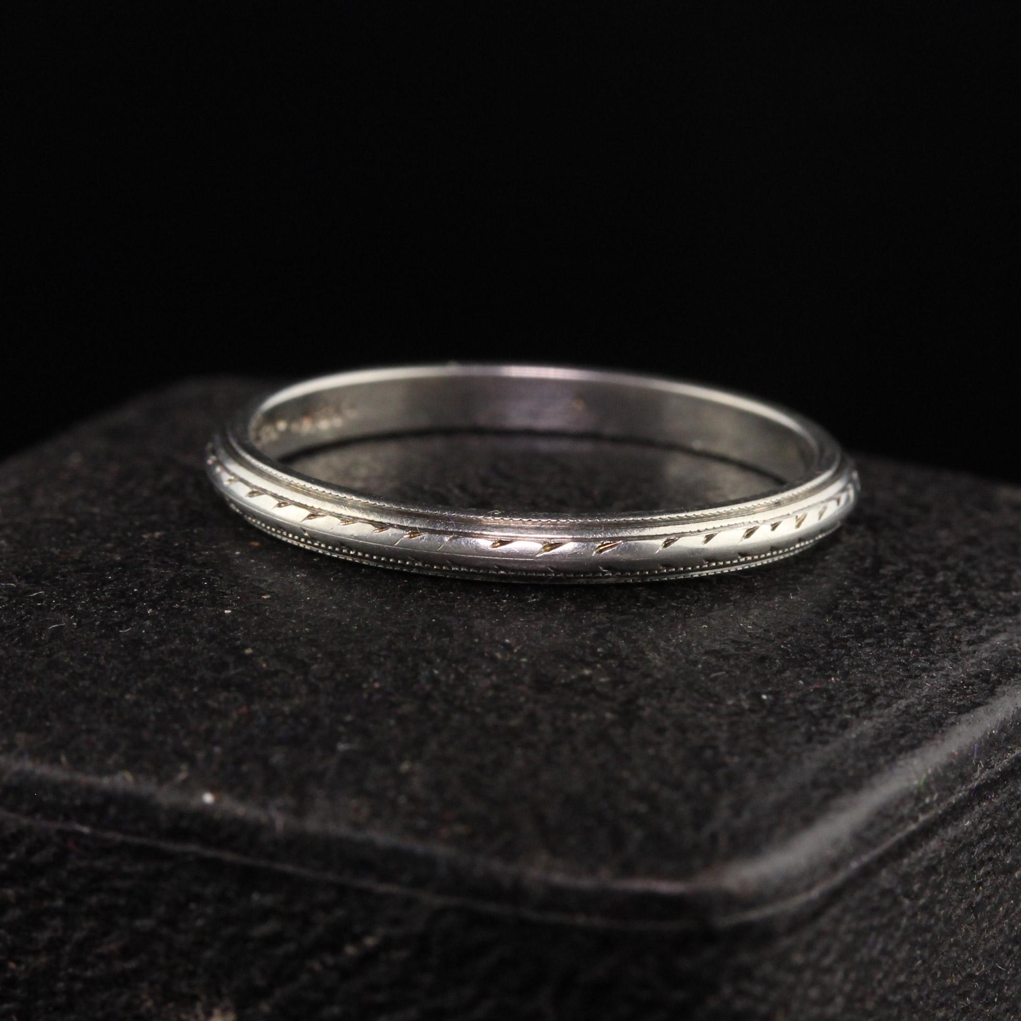 Beautiful Antique Art Deco 18K White Gold Engraved Wedding Band - Size 6. This beautiful wedding band is crafted in 18k white gold. The band is nicely engraved around the entire ring and is in good condition.

Item #R1267

Metal: 18K White