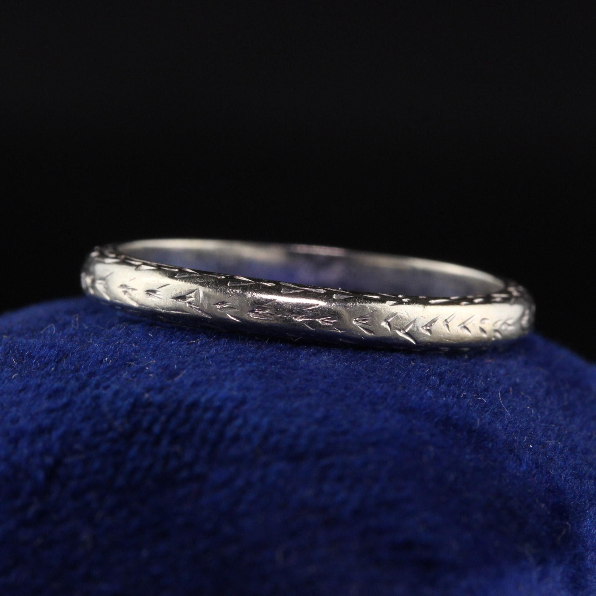 Beautiful Antique Art Deco 18K White Gold Engraved Wedding Band - Size 6. This gorgeous wedding band is crafted in 18k white gold. It is beautifully engraved around the entire ring and is in great condition.

Item #R1265

Metal: 18K White