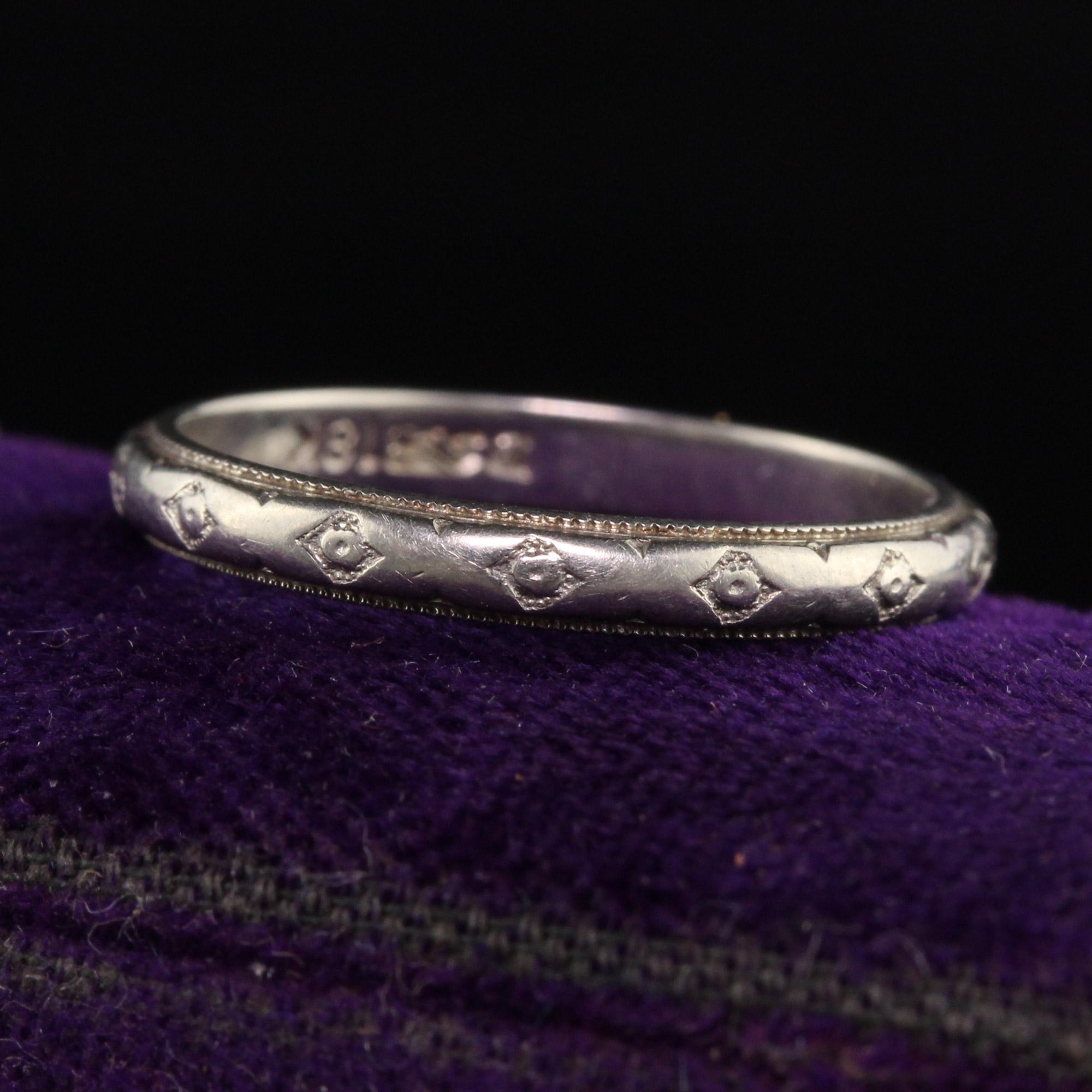 Beautiful Antique Art Deco 18K White Gold Engraved Wedding Band - Size 7. This gorgeous wedding band is crafted in 18k white gold. The band is nicely engraved around the entire ring and has some makers mark inside the band but we can't make it