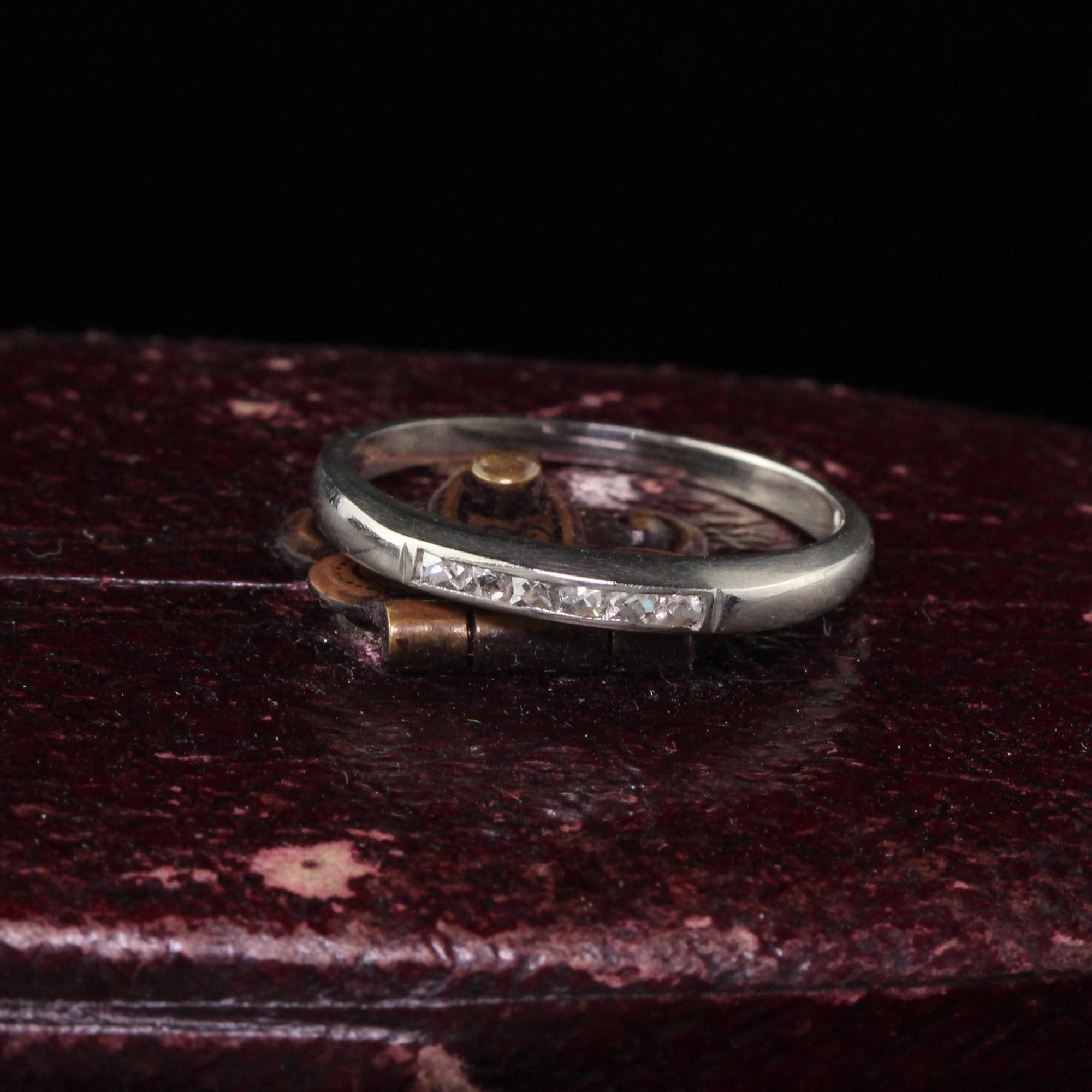 Art Deco half eternity band with a row of 6 small French cut diamonds. 

Item #R0314

Metal: 18K White Gold 

Weight: 1.7 Grams 

Total Diamond Weight: Approximately 0.10 cts French cut diamonds 

Ring Size: 5 (sizable) 

Measurements: 2.45 mm in
