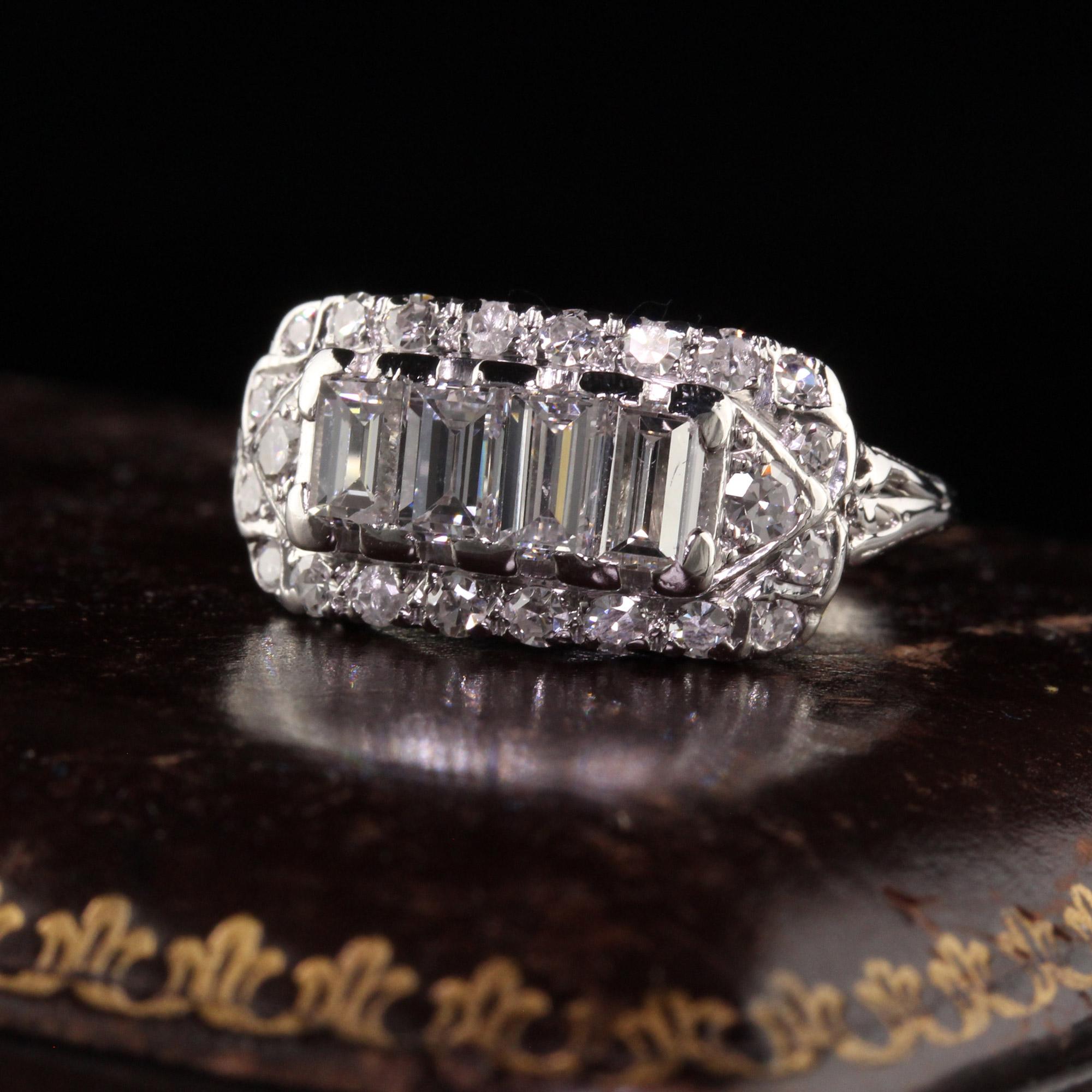 Beautiful Antique Art Deco 18K White Gold Old Cut Diamond Baguette Ring. This beautiful ring is crafted in 18k white gold. The center of the ring holds large diamond baguettes and is surrounded by single cut diamonds. The ring is in good condition