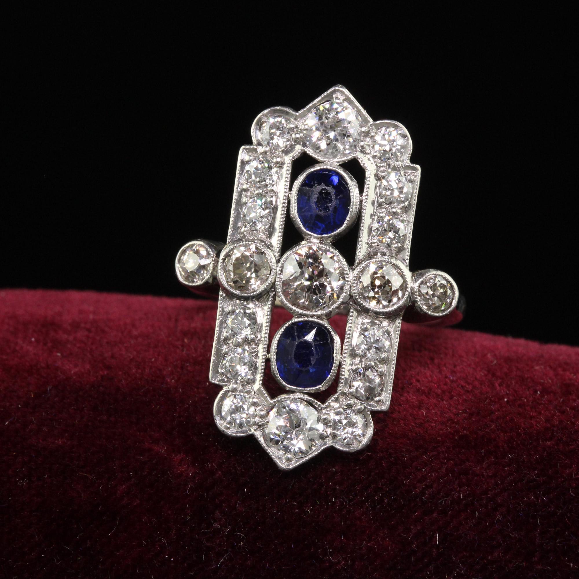 Beautiful Antique Art Deco 18K White Gold Platinum Old Euro Diamond Sapphire Shield Ring. This gorgeous Art Deco diamond and sapphire shield ring is crafted in 18k white gold and platinum top. This ring features gorgeous old cut diamonds on top with