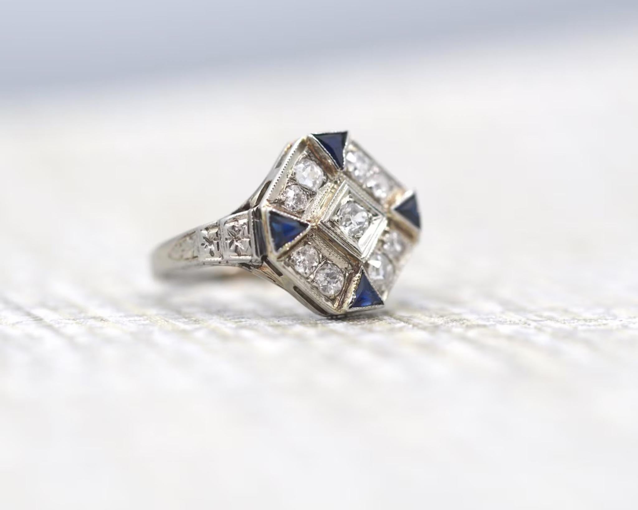 Item Details:
Ring Size: 4.5
Metal Type: Platinum Head, 18K White Gold Band
Weight: 2.25 grams

Main White Diamonds Details
Shape: Old Miner Brilliant
Carat Weight: .50ct (Approximate)
Color: F
Clarity: VS1

Side Stone Details:
Total Carat Weight: