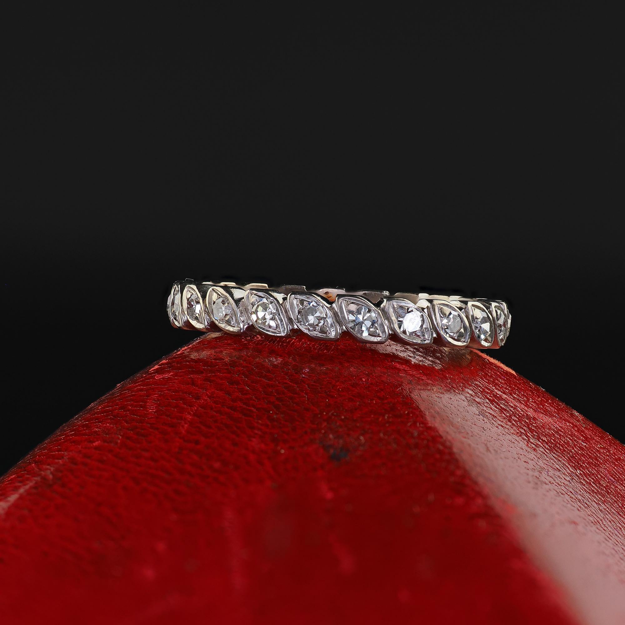 Beautiful Antique Art Deco 18K White Gold Single Cut Diamond Design Eternity Band. This amazing Art Deco single cut diamond eternity band is crafted in 18k white gold. The ring features old single cut diamonds set around the entire band. The ring