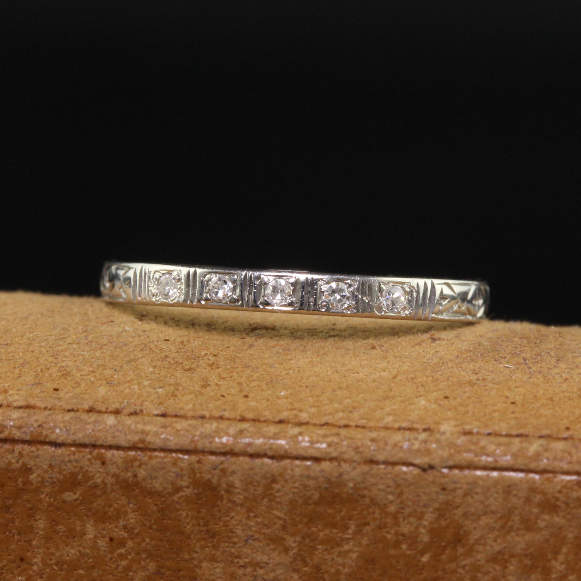 Beautiful Antique Art Deco 18K White Gold Single Cut Diamond Engraved Band - Size 5 1/2. This beautiful art deco diamond band is crafted in 18k white gold. The top of the band features five single cut diamonds and the sides of the ring are engraved.