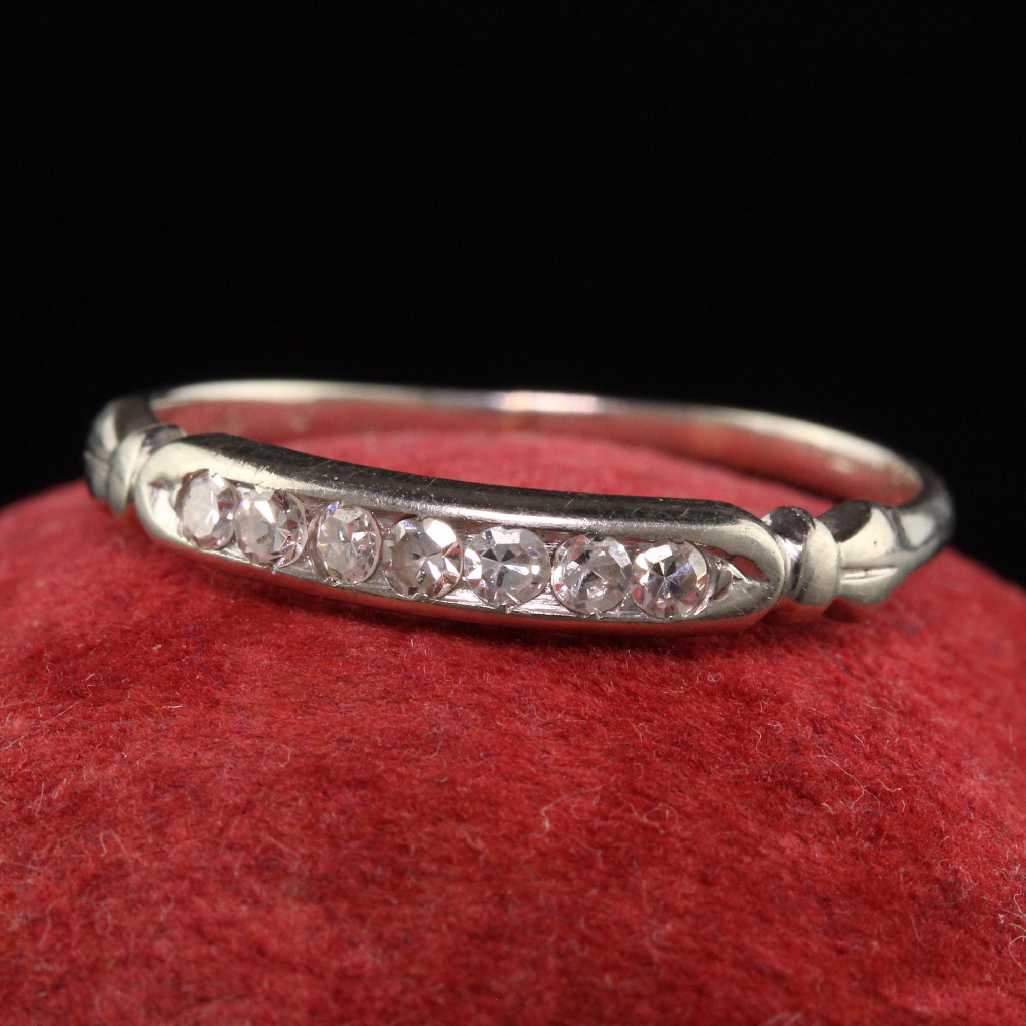 Beautiful Antique Art Deco 18K White Gold Single Cut Diamond Wedding Band. This classic wedding band is crafted in 18K white gold and has 7 single cut diamonds on the top of the band.

Item #R1181

Metal: 18K White Gold

Weight: 1.6 Grams

Size: 8