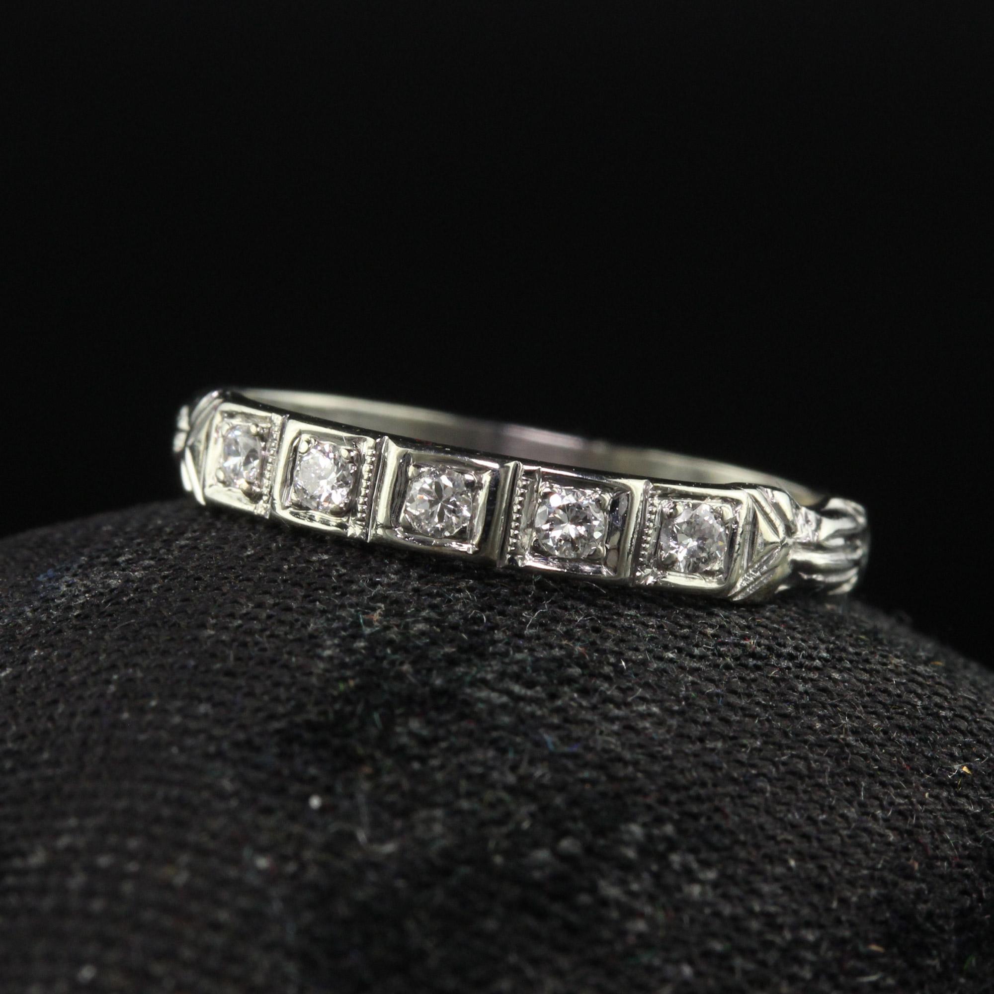 Beautiful Antique Art Deco 18K White Gold Single Cut Diamond Wedding Band - Size 4 1/2. This gorgeous wedding band is crafted in 18k white gold. The top has single cut diamonds set across it with engraved accents on each side. The ring is in good