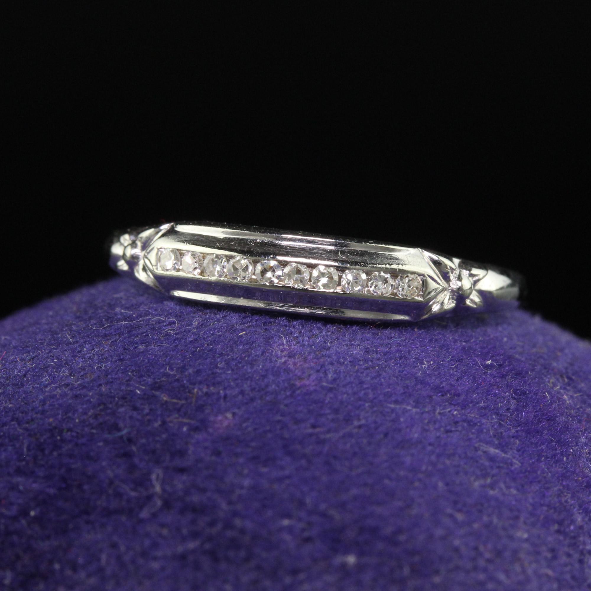 Beautiful Antique Art Deco 18K White Gold Single Cut Diamond Wedding Band - Size 6 1/2. This gorgeous wedding band is crafted in 18k white gold. The top has single cut diamonds set across it with floral accents on each side. The ring is in good