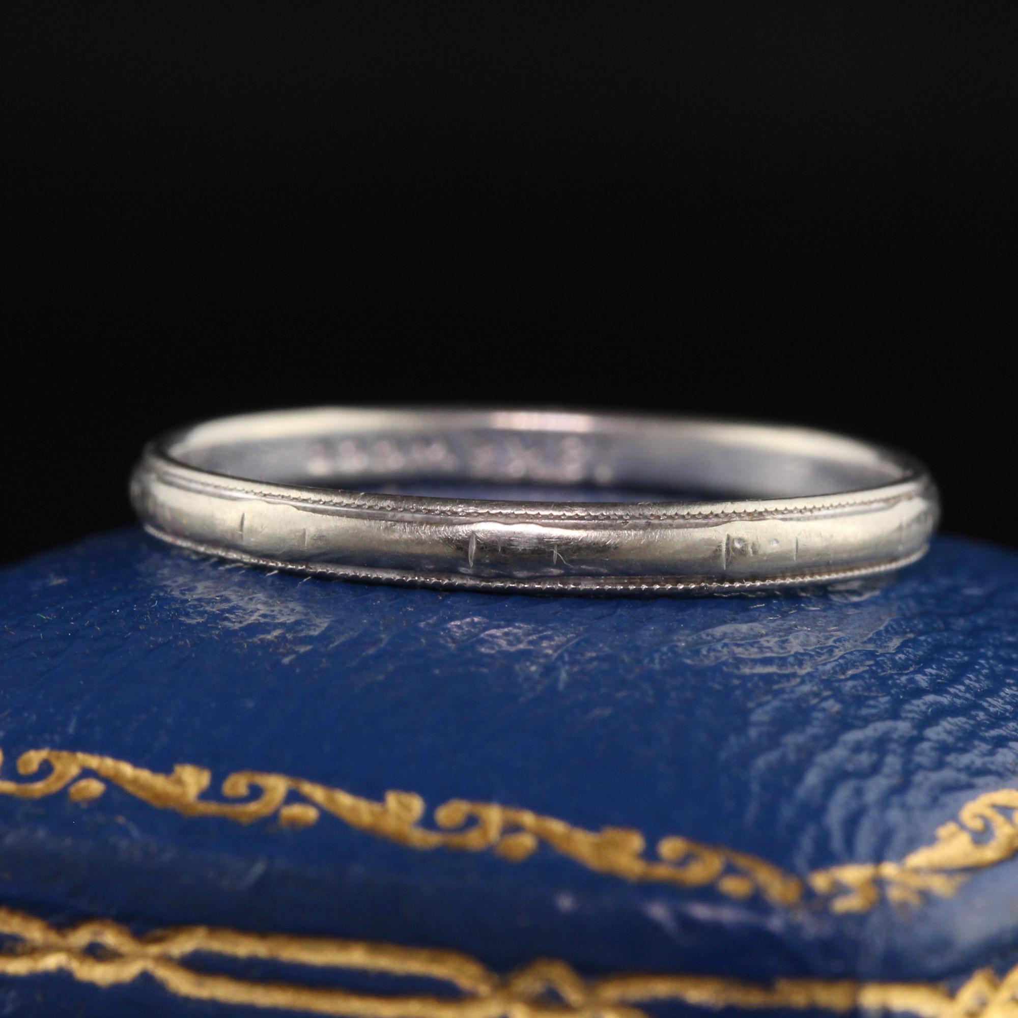 Beautiful Antique Art Deco 18K White Gold Wood Engraved Wedding Band - Size 6 1/2. This beautiful ring is crafted in 18k white gold. This band has engravings going around the entire ring and has the makers mark Wood inside the band.

Item