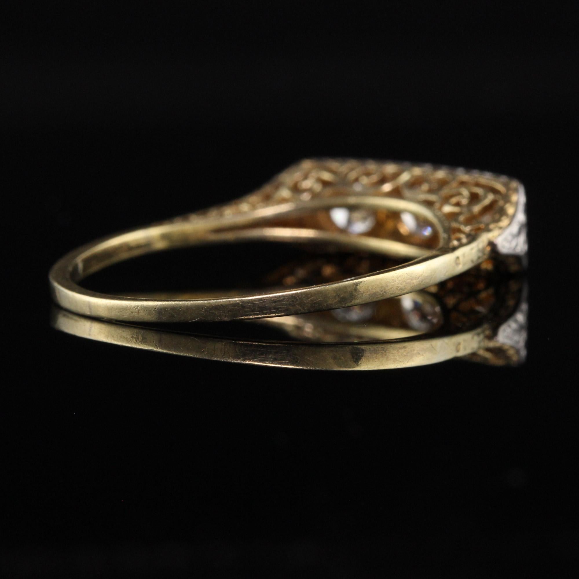 Women's Antique Art Deco 18K Yellow Gold and Platinum Three Diamond Filigree Ring For Sale