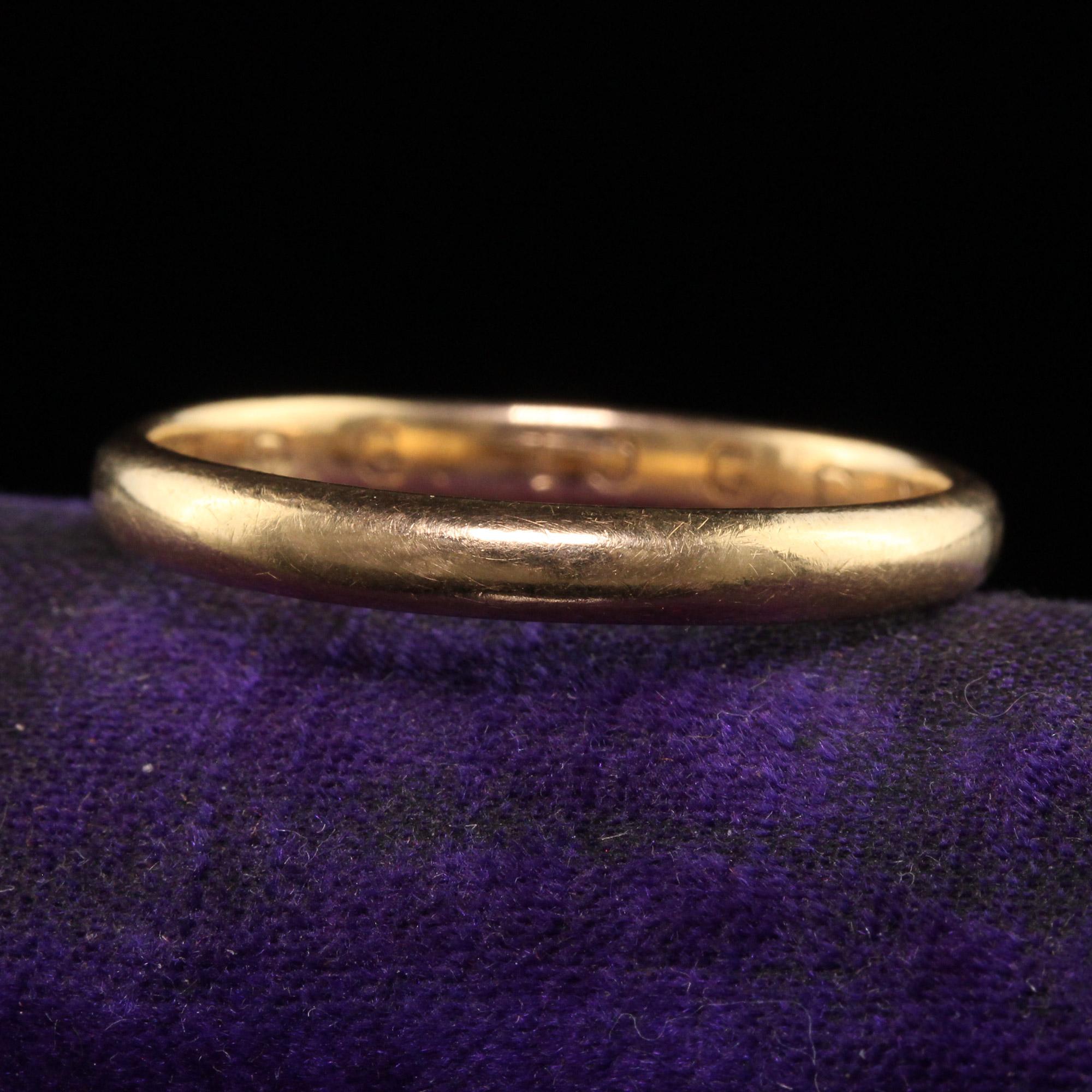 Beautiful Antique Art Deco 18K Yellow Gold Classic Engraved Wedding Band - Size 13. This classic wedding band is crafted in 18k yellow gold. The inside of the band is engraved D. G. to G. C. 12. 28. 27.