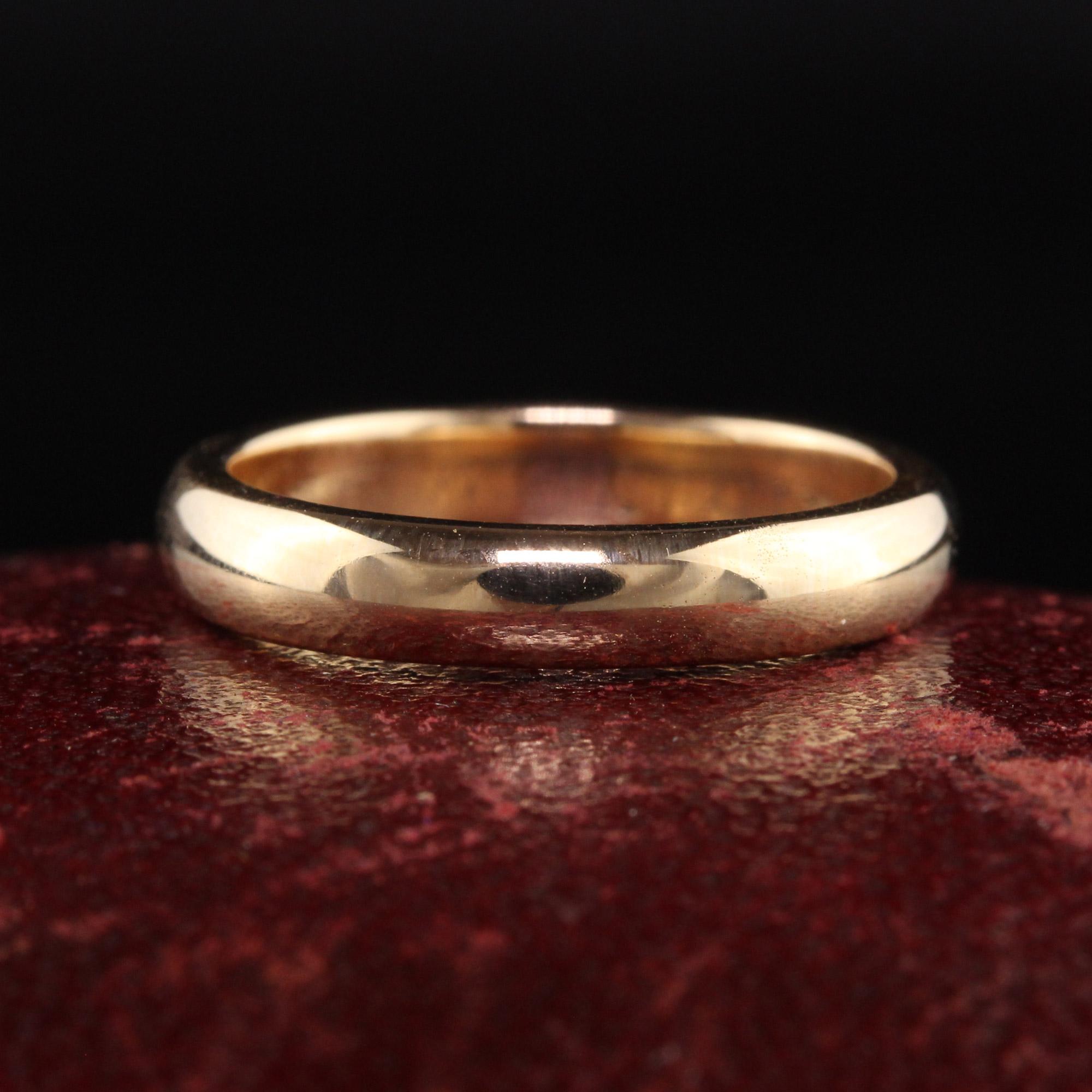 Beautiful Antique Art Deco 18K Yellow Gold Classic Wedding Band - Size 5. This classic wedding band is crafted in 18k yellow gold. This classic band has engravings inside the ring but they are faint and we can make out the words 
