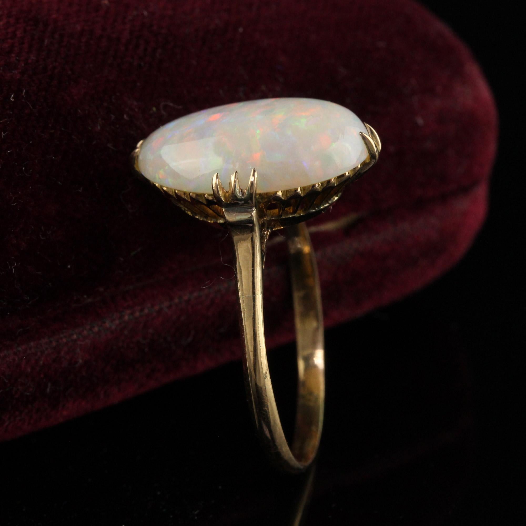 Antique Art Deco 18K Yellow Gold Natural Cabochon Opal Filigree Ring In Good Condition For Sale In Great Neck, NY