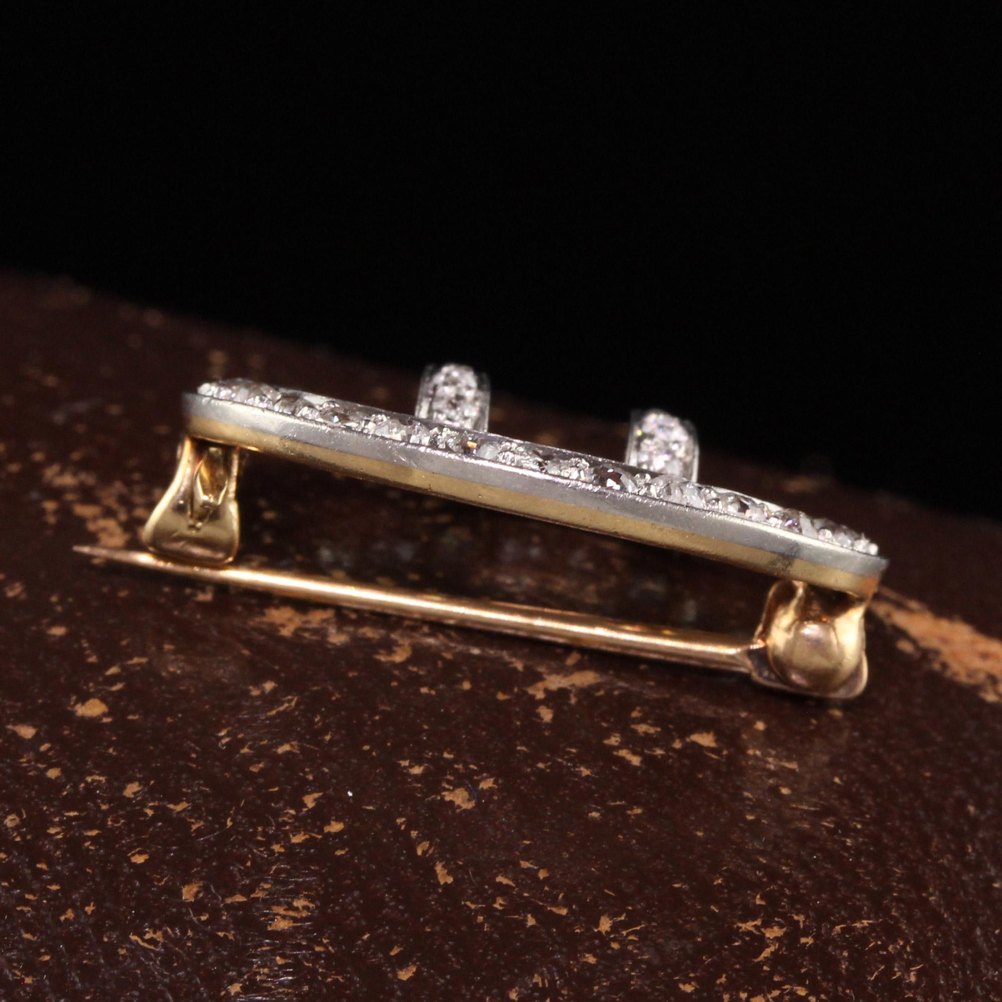 Beautiful Antique Art Deco 18K Yellow Gold Platinum Old Mine Diamond Buckle Pin. This beautiful pin is crafted in 18K yellow gold and platinum top. It has old mine cut diamonds all over the pin and is in great condition. It can also be converted to