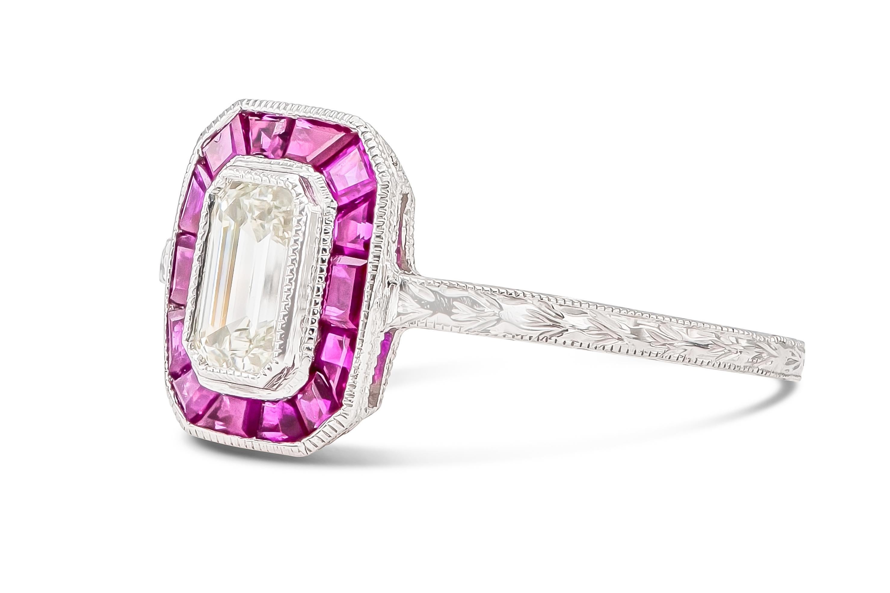 Finely crafted in platinum with an Emerald cut Diamond weighing 0.52 carat and accenting Rubies weighing approximately a total of 1.40 carats.
Circa 1920s
Size 6 3/4, resizable