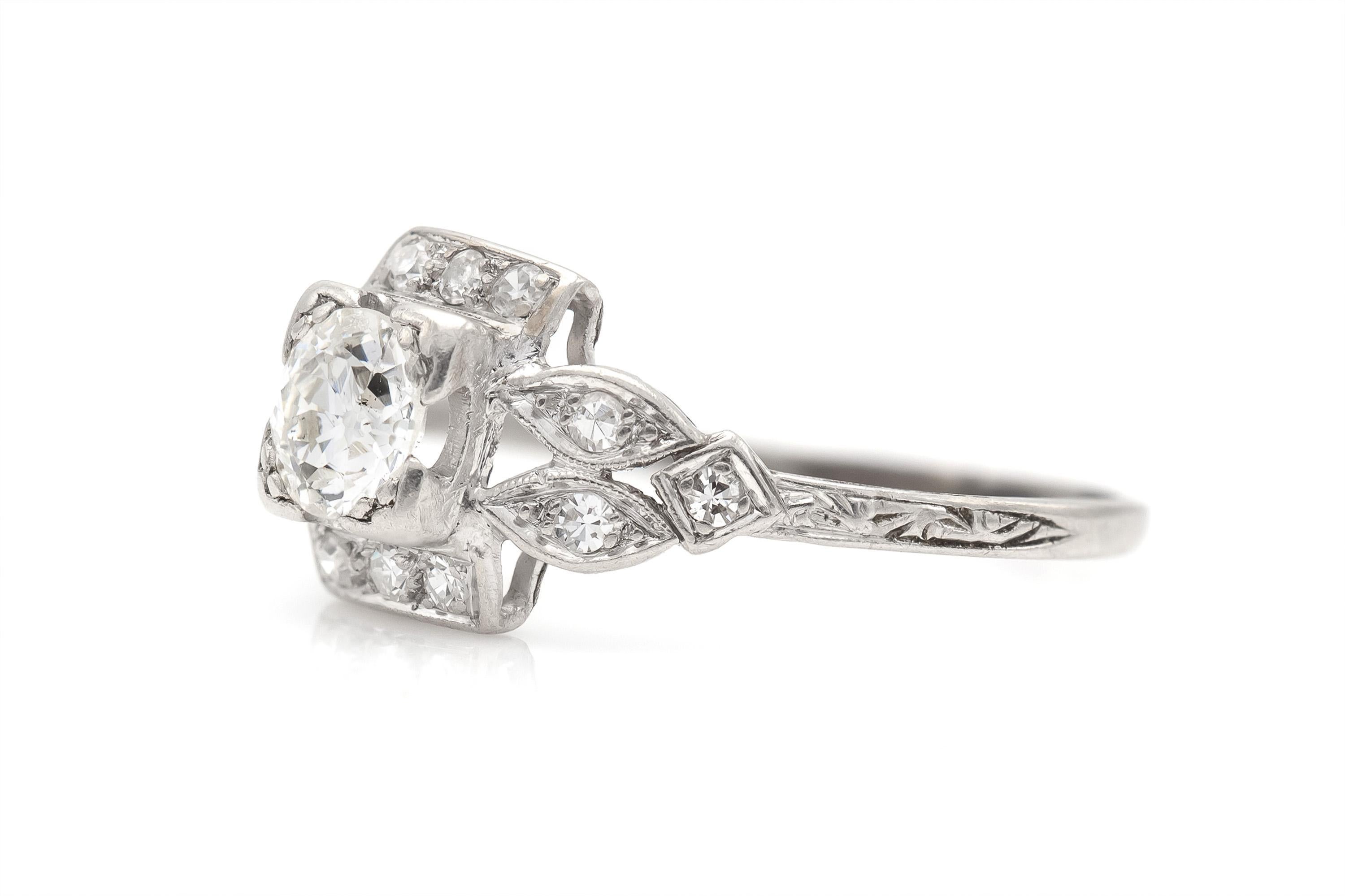 Finely crafted in platinum with an Old European cut Diamond weighing approximately 0.80 carat, G color, SI1 clarity
The ring features accenting small Diamonds on the setting weighing a total of approximately 0.30 carat.
Circa 1920s
Size 9 3/4,