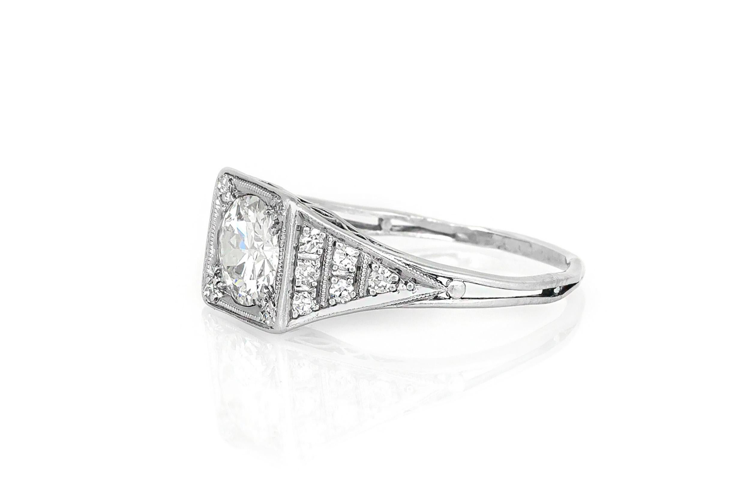 Finely crafted in platinum with an Old European cut Diamond at the center weighing approximately 1.00 carat, I color, VS2 clarity.
The ring also features smaller accenting Round cut Diamonds on the setting.
Circa 1920s
Size 7 1/4, resizable