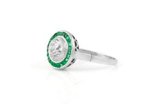 Antiker Art Deco 1920er Jahre 1,50 Karat Diamantring mit Smaragden im alten Minenschliff und Target-Ring mit Smaragden