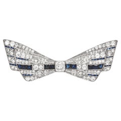 Arte Antiques Art Deco 1920s 2.70 Carat Diamond Bow Brooch with Sapphires