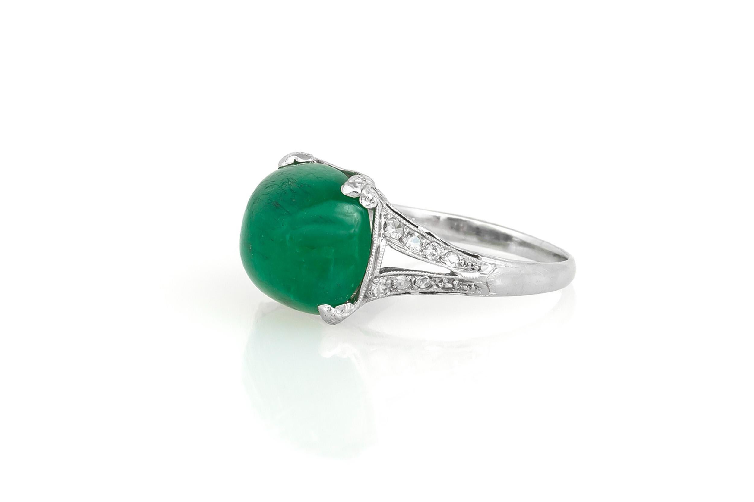 Finely crafted in platinum with a Sugarloaf Emerald weighing approximately 6.50 carats and small accenting Diamonds on the setting.
Circa 1920s
Size 5, resizable