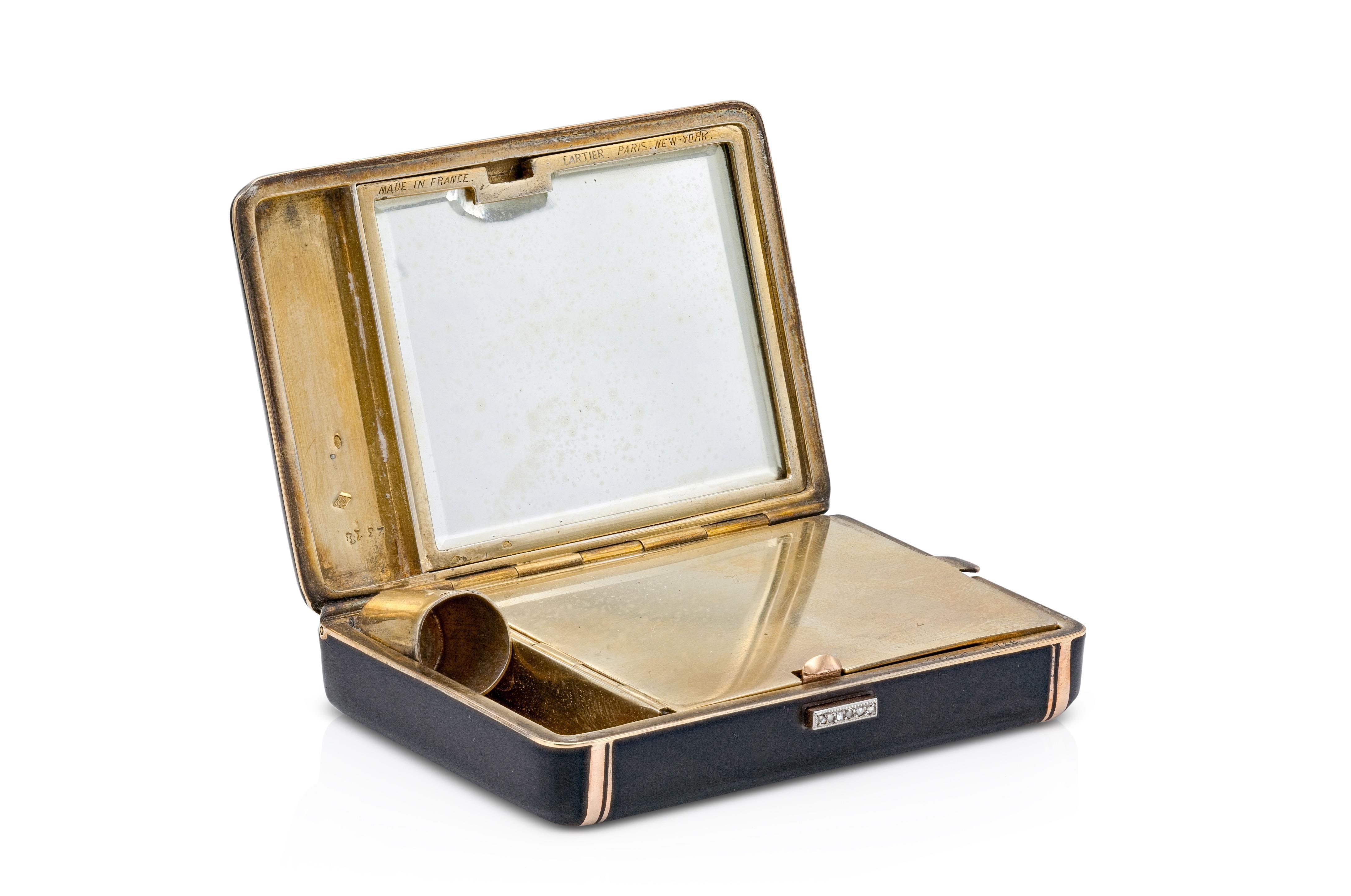 Finely crafted with black enamel over 18k yellow and rose gold, Round cut Diamonds on the opening mechanism, and a mirror.
Signed by Cartier
Circa 1920s
1 3/4 x 2 5/8 x 9/16 inch