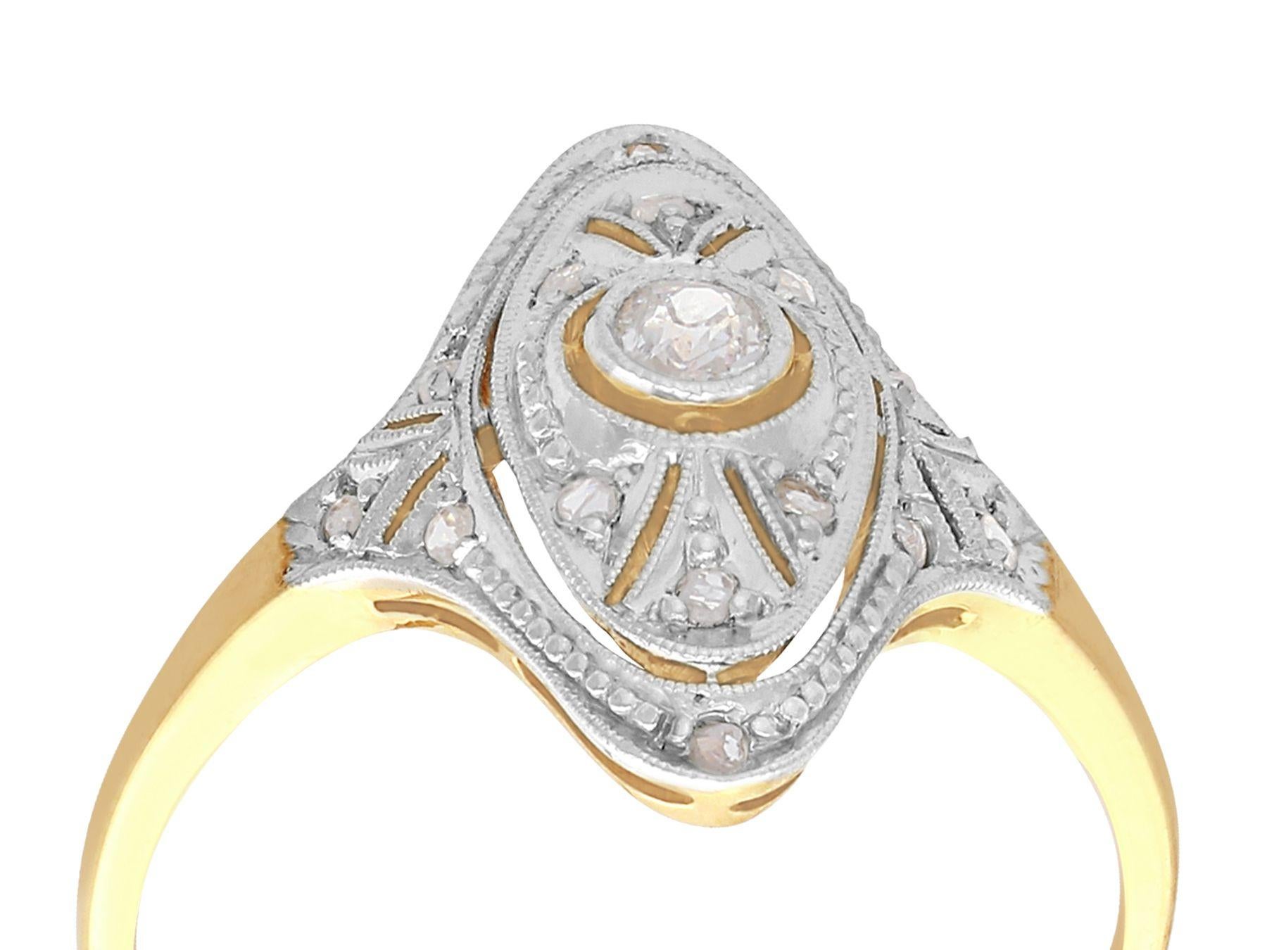 Ein beeindruckender Marquise-Ring mit 0,12 Karat Diamant und 14 Karat Gelbgold und 14 Karat Weißgold; Teil unserer vielfältigen Sammlungen von antikem Schmuck und Nachlassschmuck.

Dieser feine und beeindruckende antike Diamantring aus den 1920er