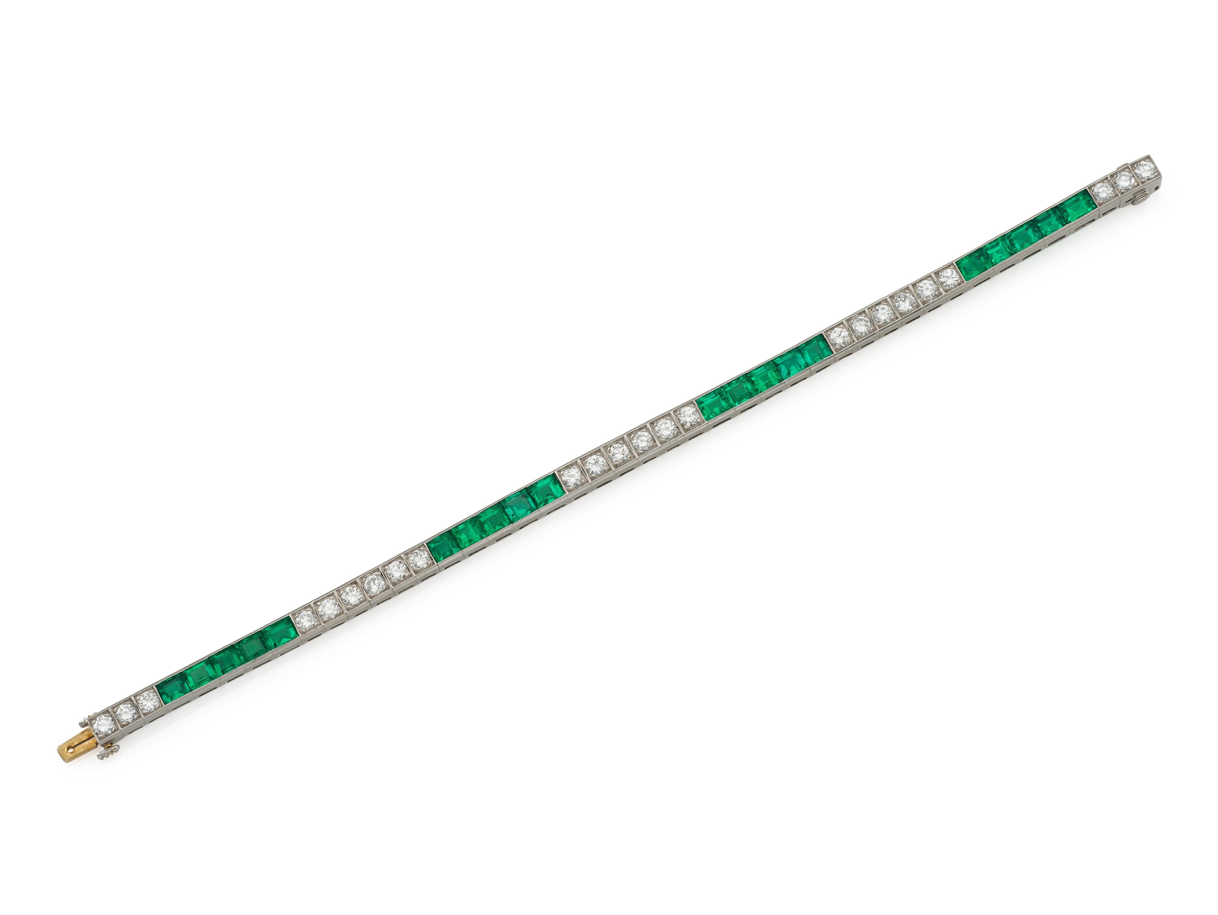Finely crafted in platinum with 20 Rectangular cut Emeralds weighing approximately a total of 8.00 carats, and 24 Old European cut Diamonds weighing approximately a total of 5.00 carats.
Signed by Tiffany & Co.
Circa 1920s
Size 6 7/8 inches
Comes