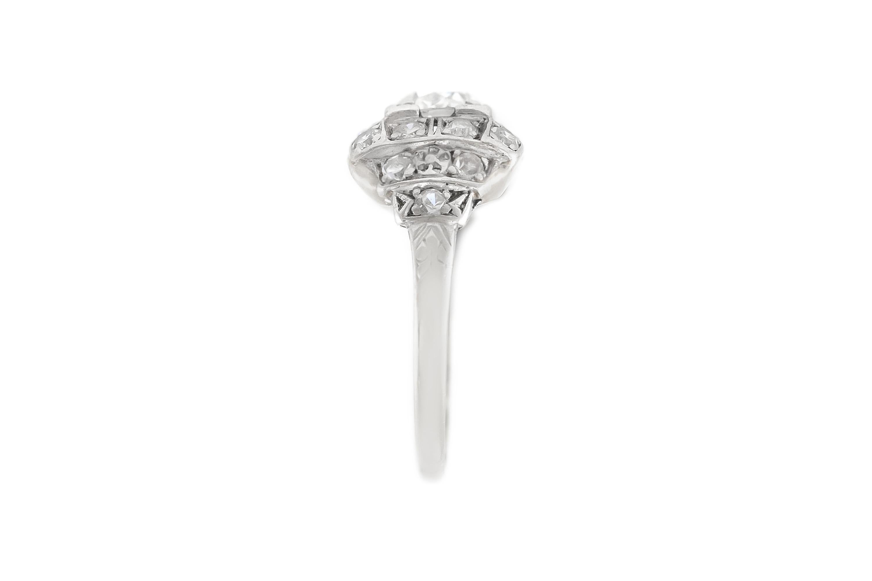 Finely crafted in platinum with an Old European cut Diamond weighing approximately 0.70 carat.
The ring features small Diamonds on the setting weighing a total of approximately 0.50 carat.
Circa 1930
Size 6, resizable