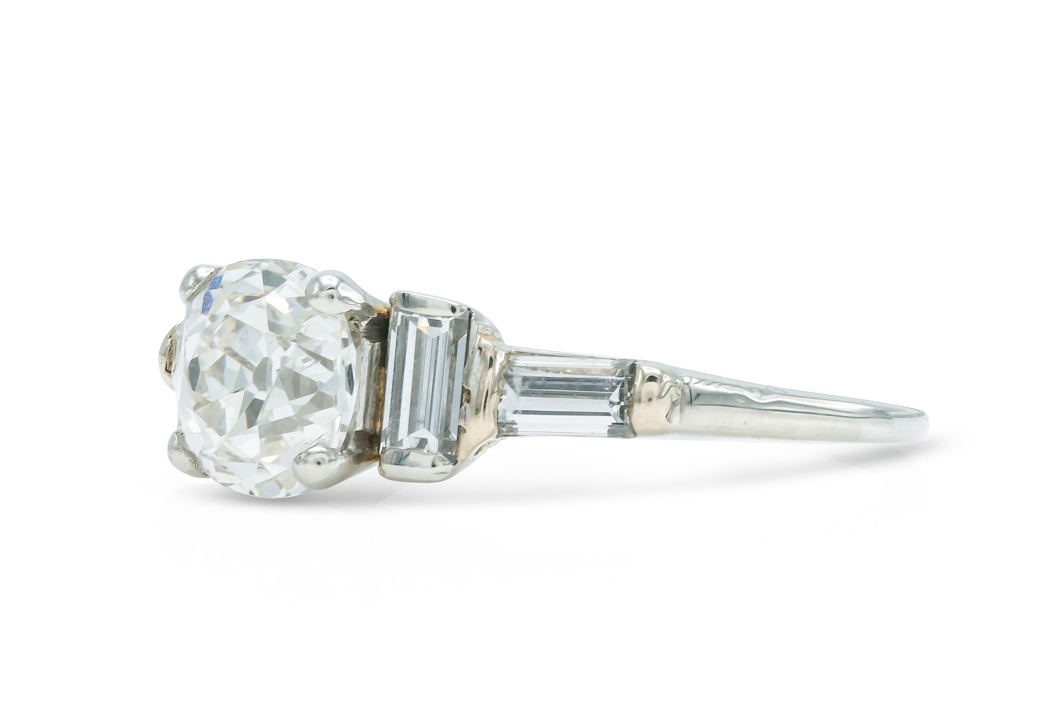 Finely crafted in platinum with a GIA certified Old Mine cut Diamond weighing 1.03 carats, F color, I2 clarity, GIA #7312552435.
The ring features 4 Baguette cut side Diamonds.
Circa 1930s
Size 6 1/2, resizable