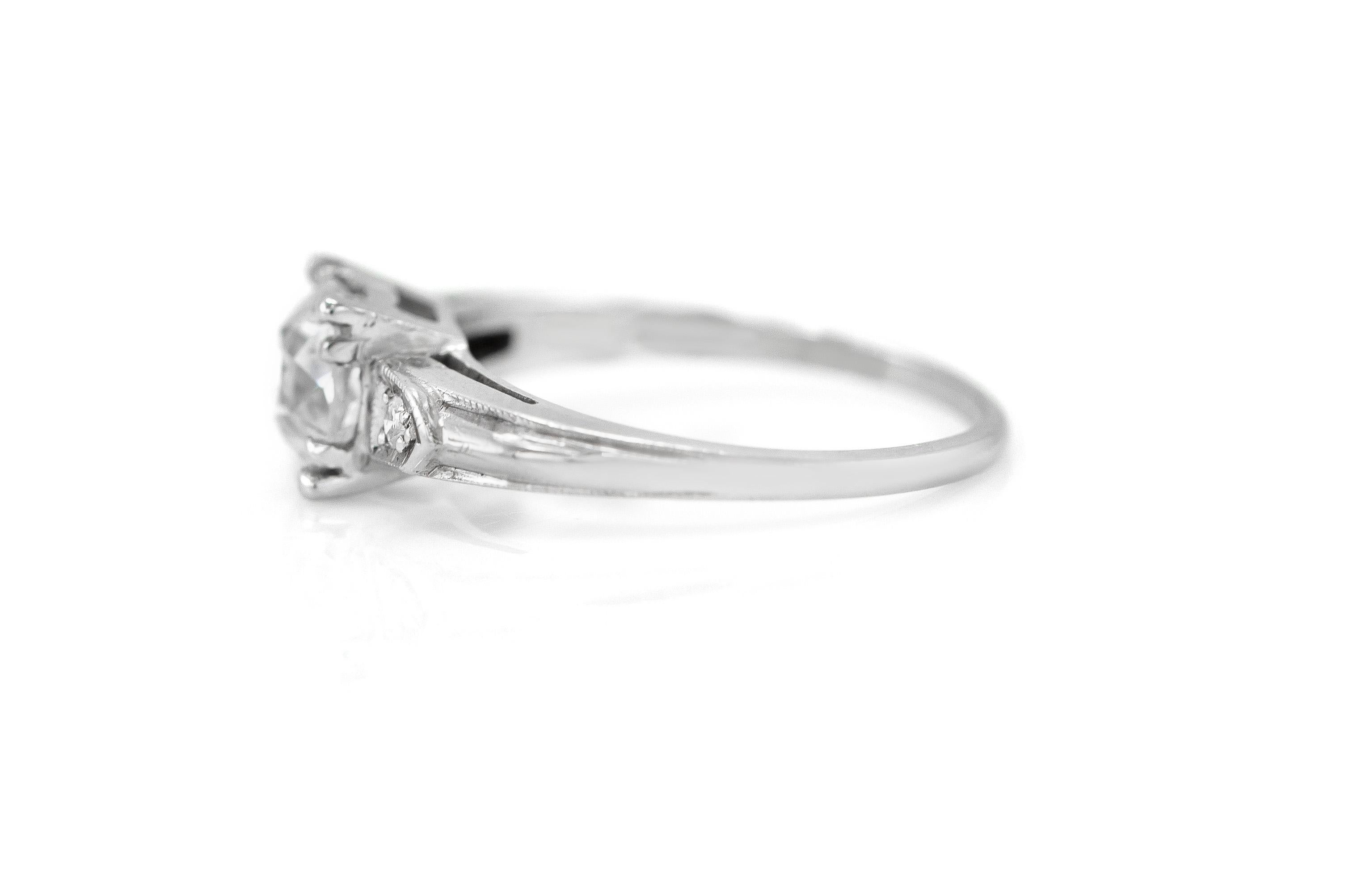 Finely crafted in 18k white gold with an Old European cut Diamond weighing approximately 1.25 carats, I color, VS2 clarity.
The ring features 2 Single cut side Diamonds weighing a total of approximately 0.10 carat. 
Circa 1930s
Size 6, resizable