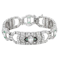 Antique Art Deco 1930s 13.50 Carat Diamond Bracelet with Emeralds and Onyx