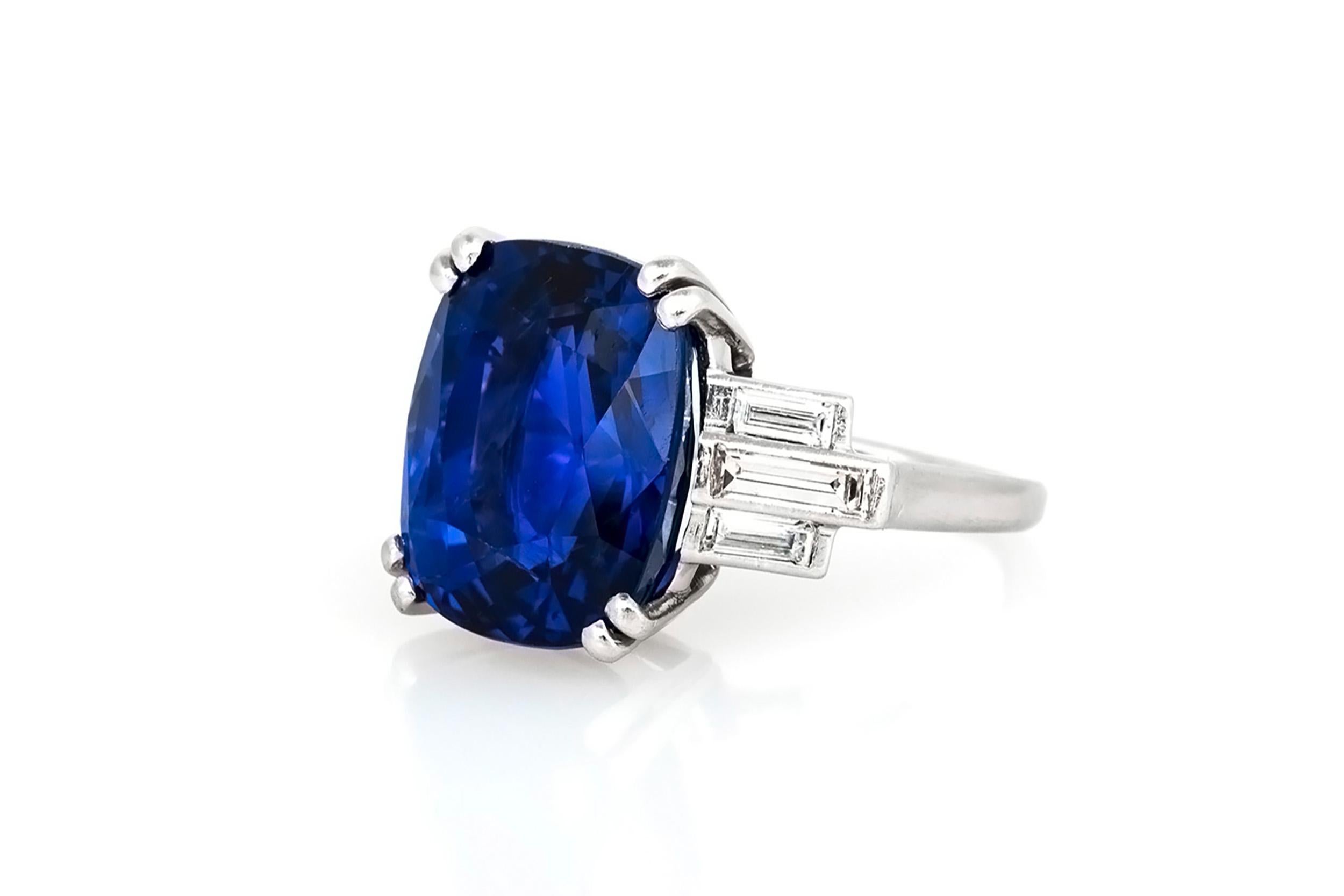 Finely crafted in platinum with an AGL certified, Ceylon origin, non-heat treated, Cushion cut Sapphire at the center weighing 17.13 carats, accented by Baguette cut Diamonds weighing a total of approximately 0.70 carats. 
Circa 1930s
Size 4 3/4,