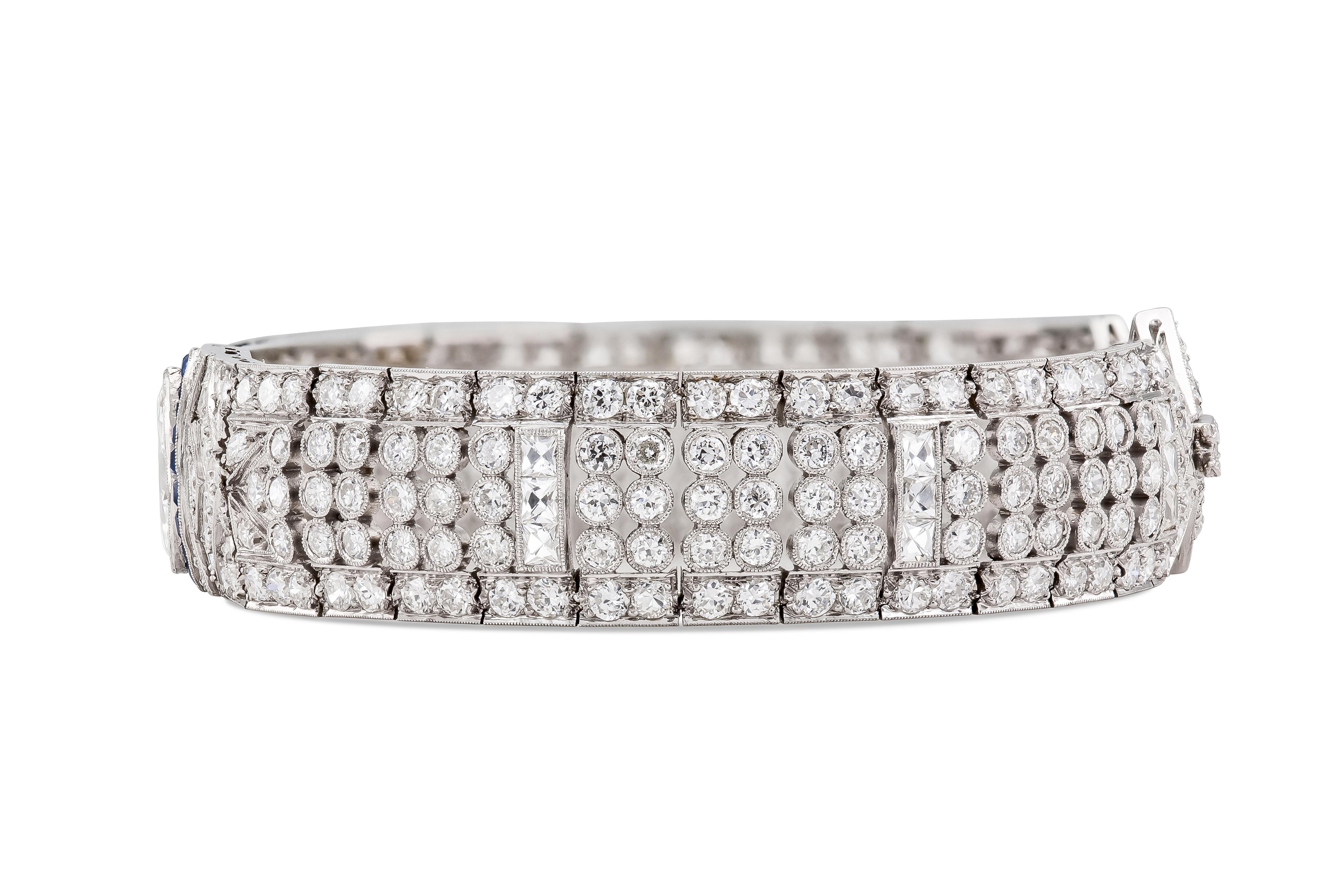 Finely crafted in platinum with a Marquise cut Diamond weighing approximately 1.00 carat, French cut Diamonds weighing a total of approximately 2.00 carats, and Old European cut Diamonds weighing a total of approximately 15.00 carats. The bracelet