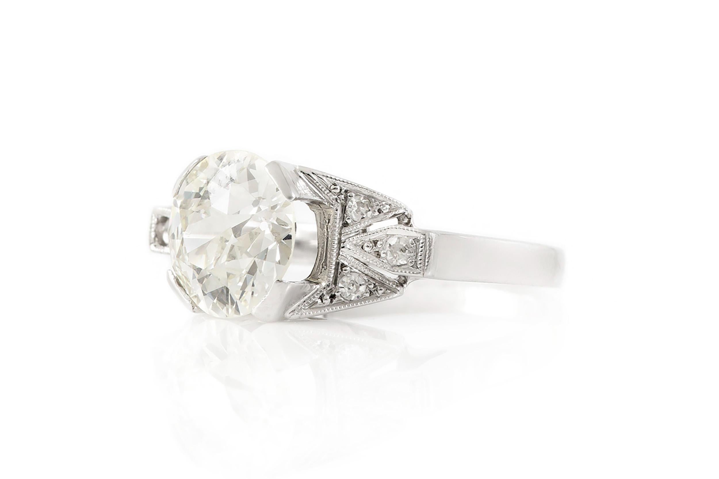 Finely crafted in platinum with an Old European cut Diamond at the center weighing 2.41 carats, K color, SI1 clarity, and accenting single cut Diamonds.
Circa 1930s
Size 5 1/4, resizable